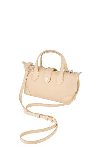 Stoney Clover Lane Pouchette Crossbody Bag in Sand from Revolve.com | Revolve Clothing (Global)