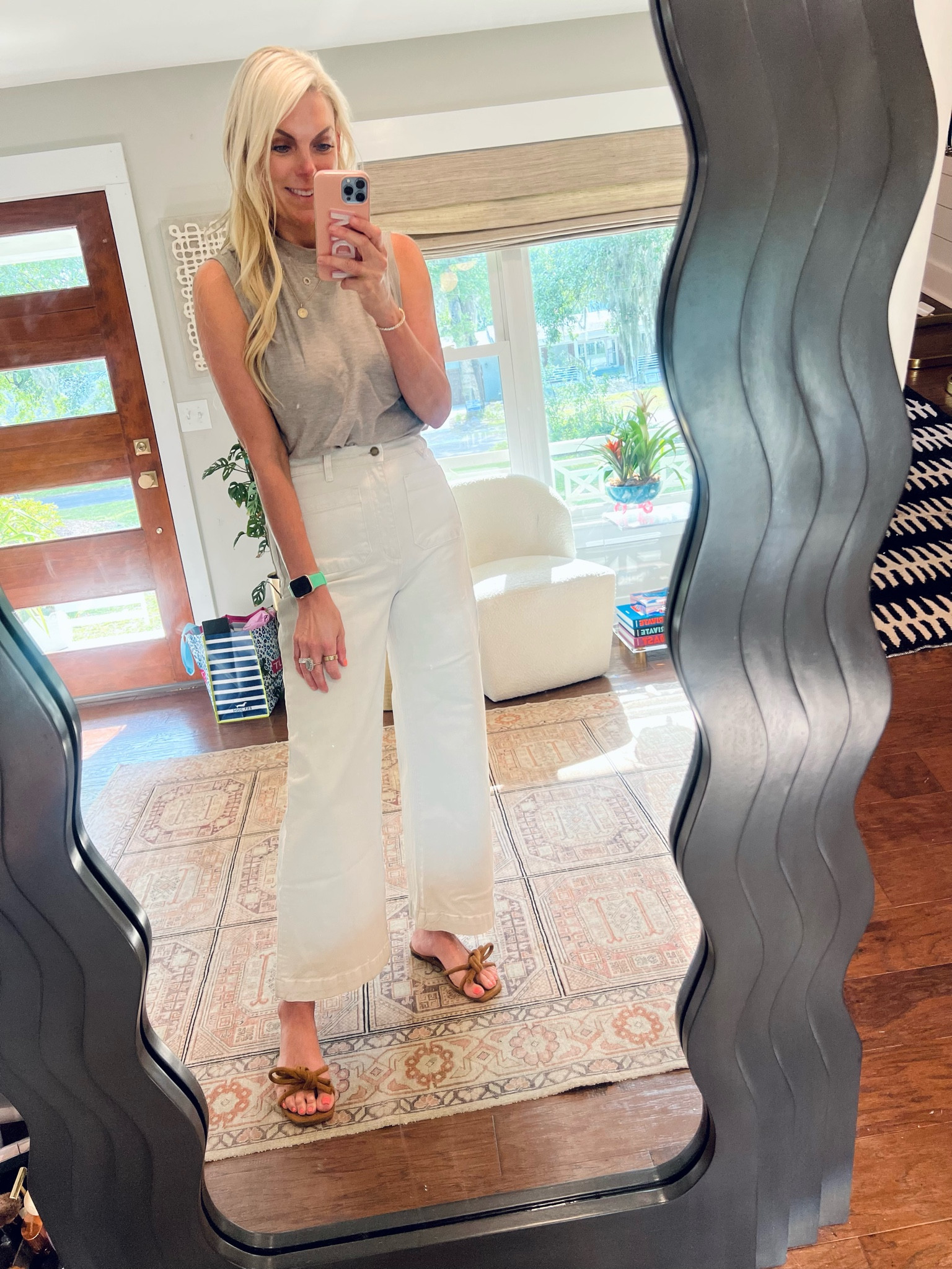 Wearing medium in tank and 29 in jeans 