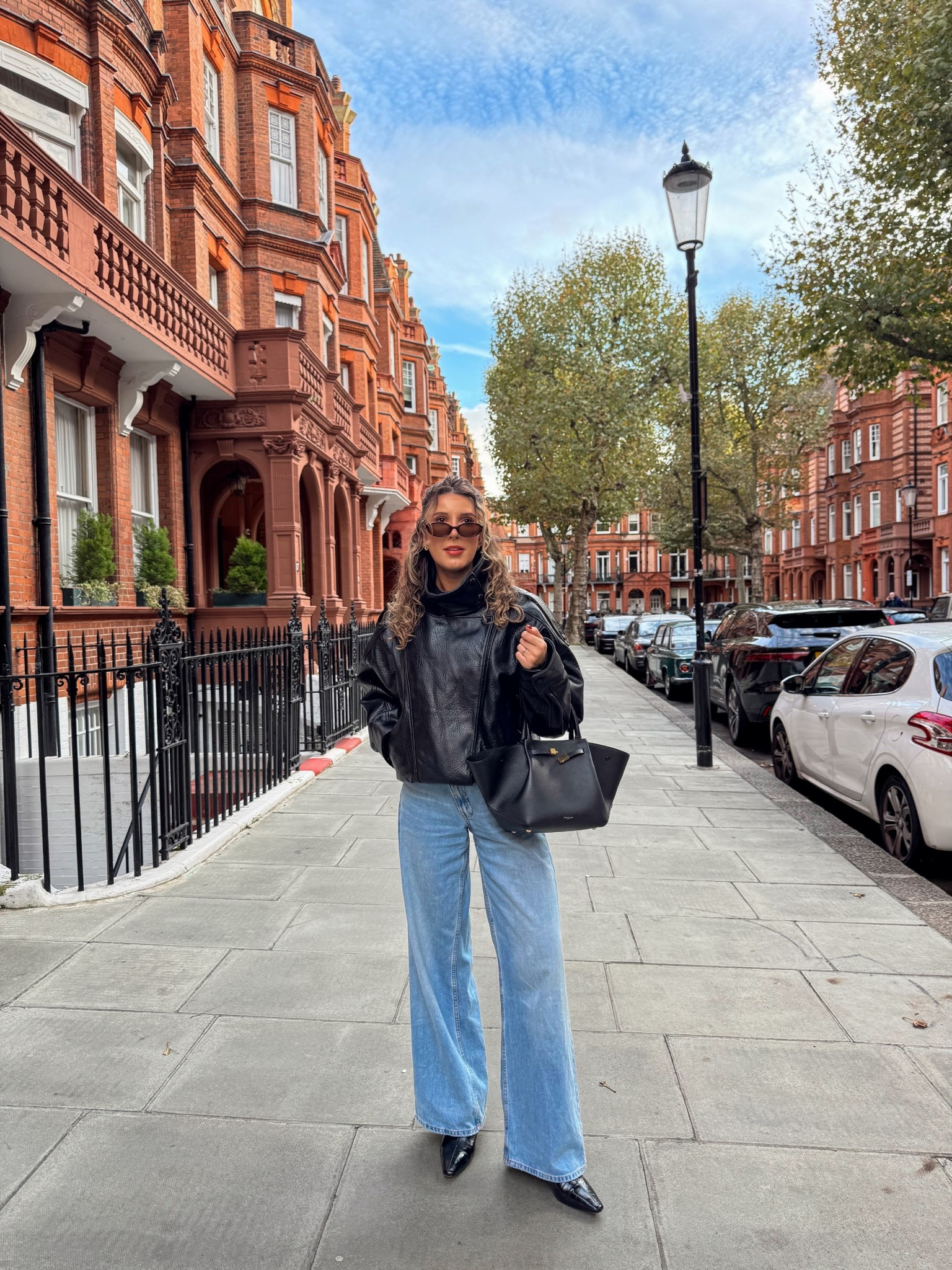 An autumn outfit formula I wear on repeat 🔂 

These wide leg jeans are such a great high street find and I love the asymmetric button detail. I’ve not stopped wearing them. Paired here with a black long sleeve top, black heeled ankle boots and this insane Saint Laurent inspired funnel neck oversized faux leather jacket.

#LTKautumn #LTKuk #LTKeurope