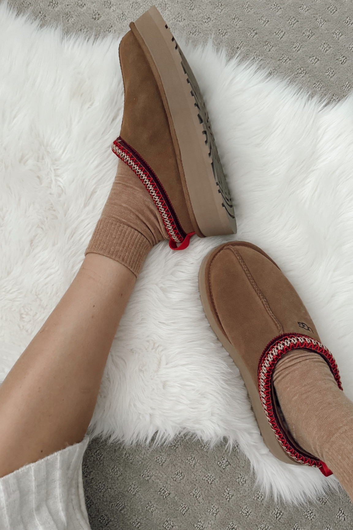 Are your feet always freezing like mine? 🤎 Viral Ugg Tazz slippers paired with the perfect height / thickness socks from Amazon will keep you toasty warm in these cold months 🙌🏼✨

#LTKShoeCrush #LTKStyleTip