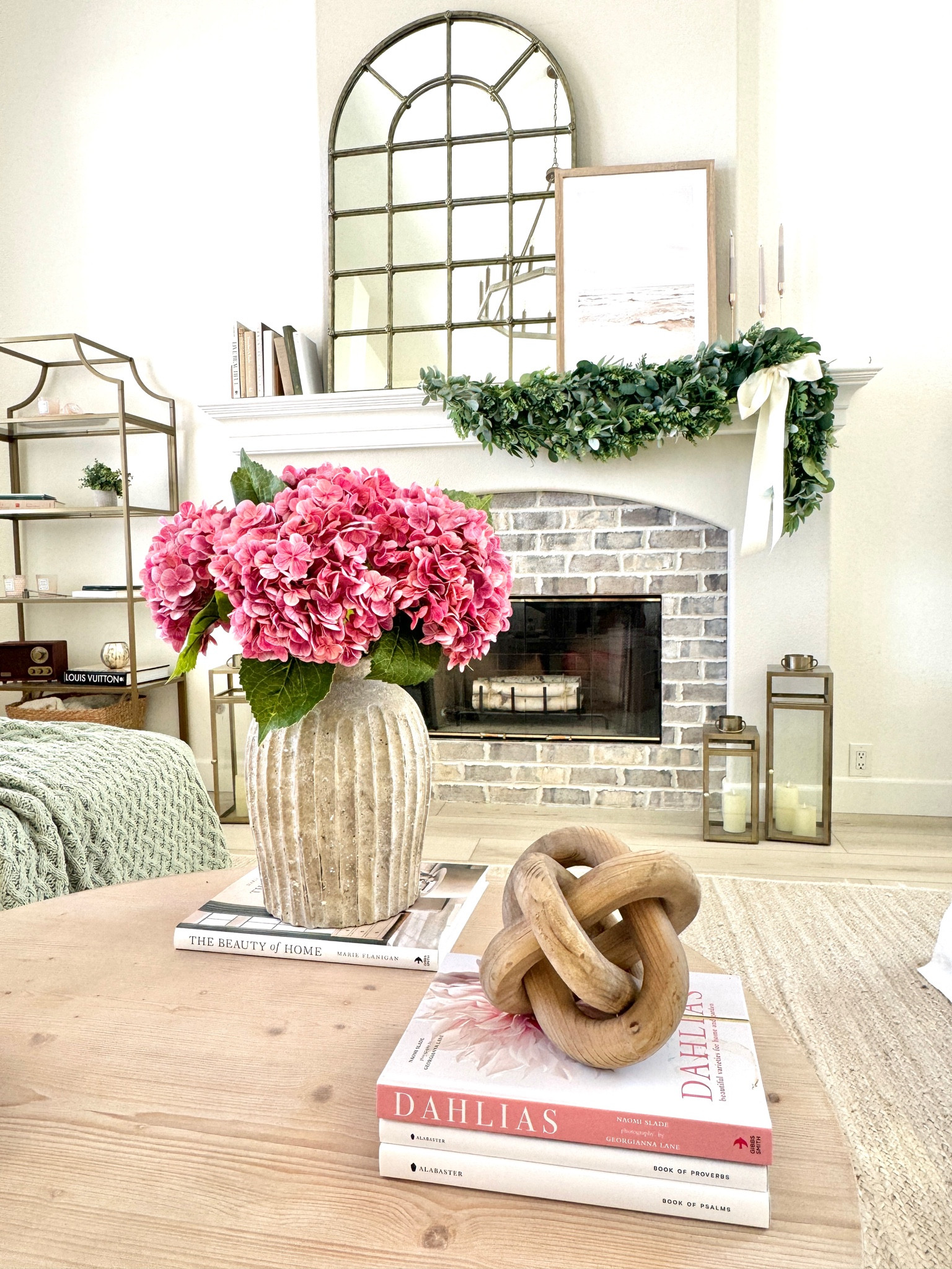 Faux hydrangeas 
Garland 
Mantle decor 
Floral stems 
How to decorate 

#LTKFamily #LTKStyleTip #LTKHome