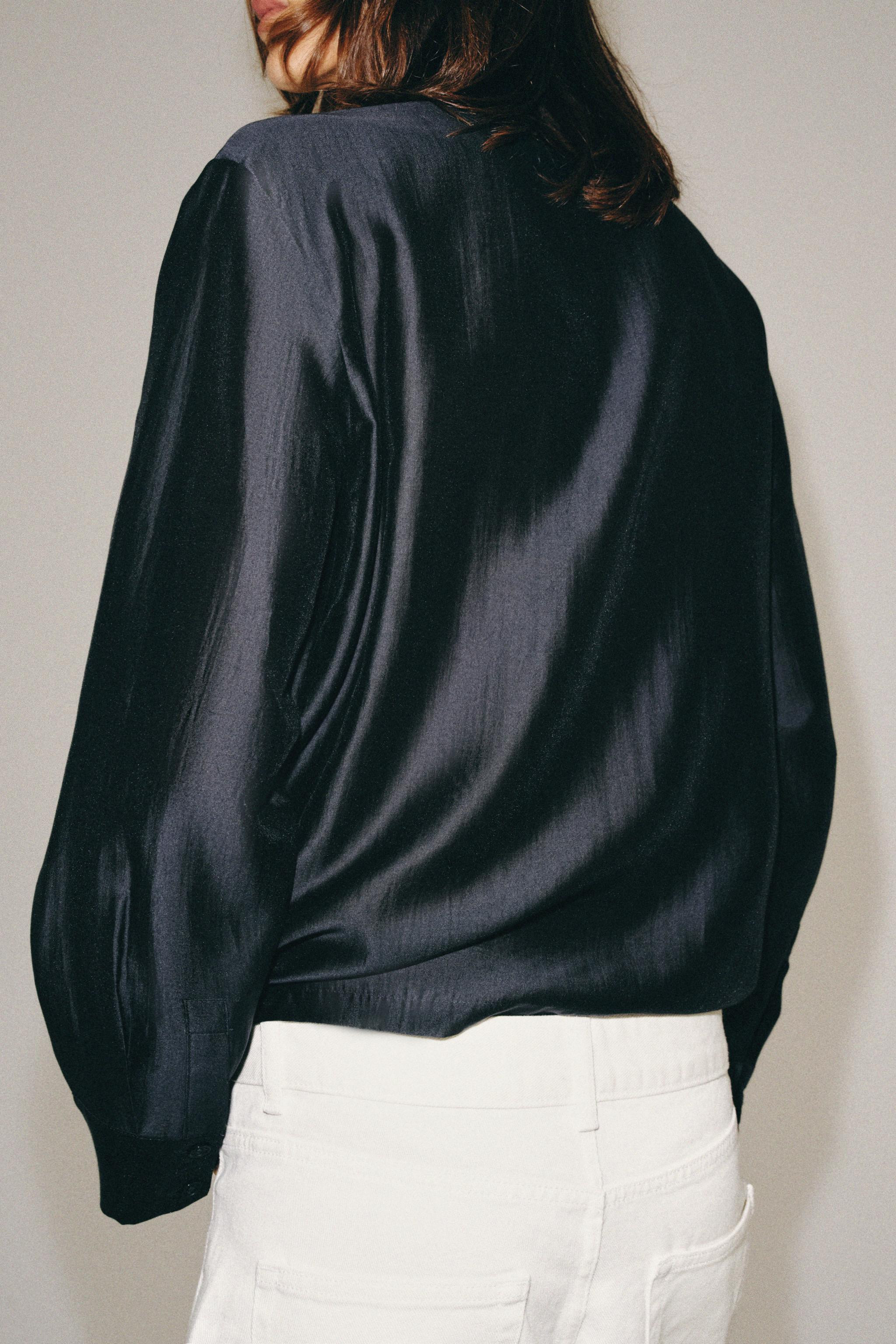 ZARA WOMAN COLLECTIONShirt made from a lyocell blend yarn. Round neck and long sleeves with cuffs... | Zara US