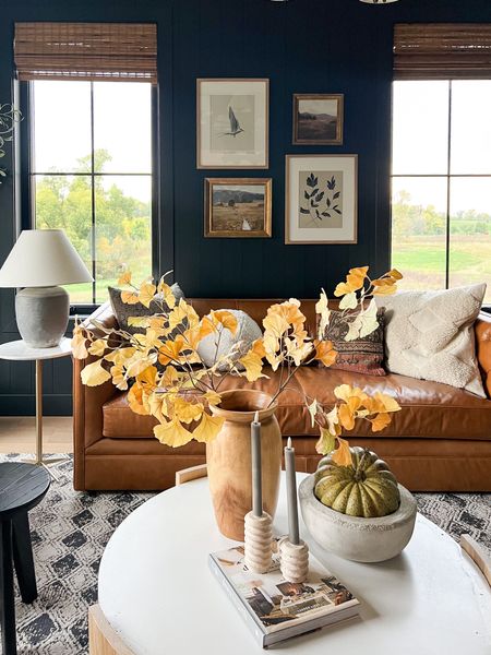 The den styled for fall! I still just love the artwork we included in the gallery wall. The two framed landscape prints are from Target, and the other two are from Juniper. It's amazing how the right prints can totally transform a space!

#frames #wallart #falldecor #sidetable #studiomcgee 

#LTKSeasonal #LTKHoliday #LTKhome