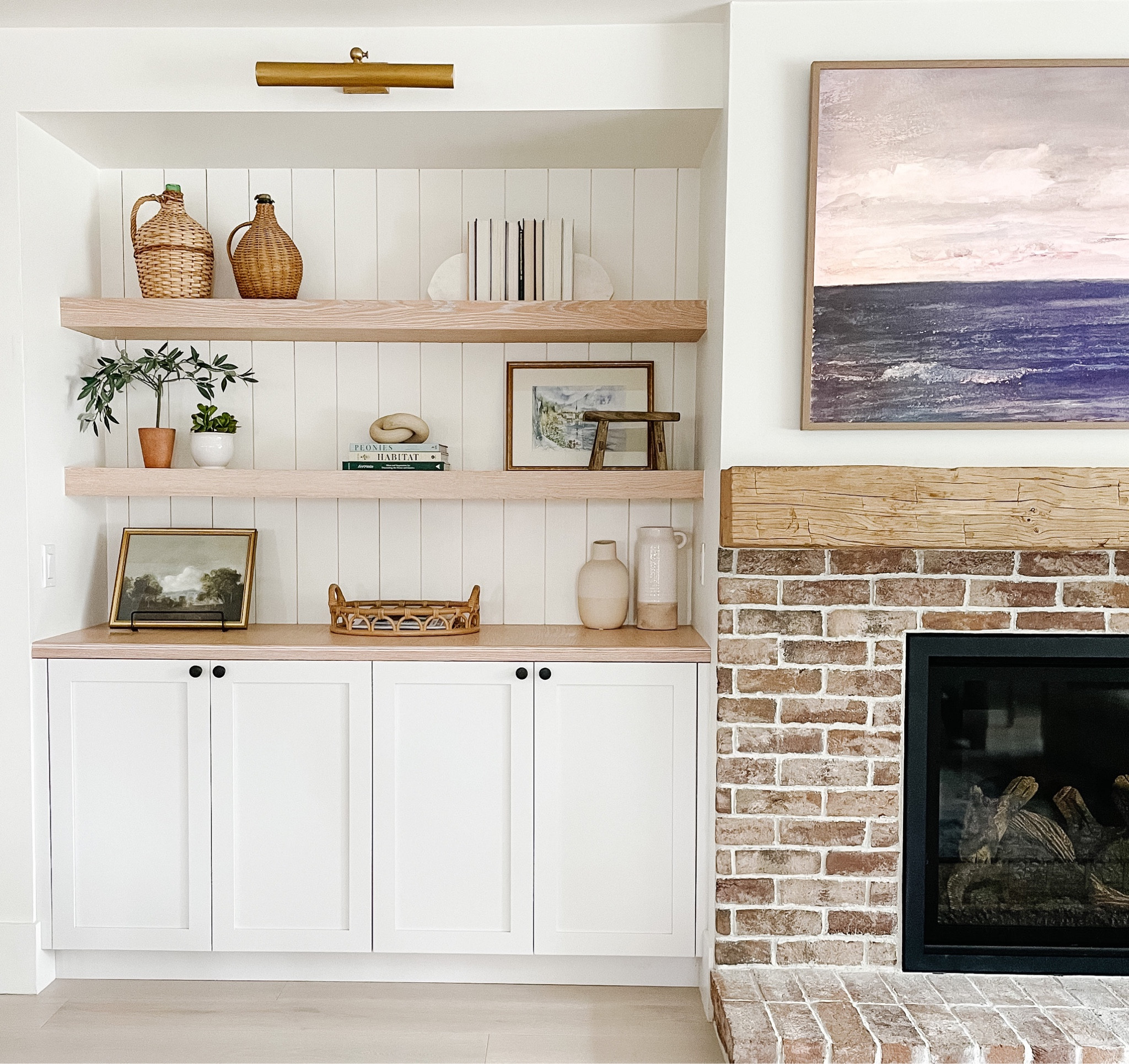 Shelfie styling mixing old and new.  Frame TV or vintage wood mantel . Landscape art from www.peonyandolive.com

#LTKhome