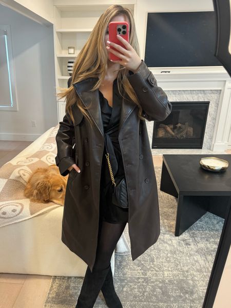 Love this leather trench coat 😍 insane quality! I’m wearing a size xs!!