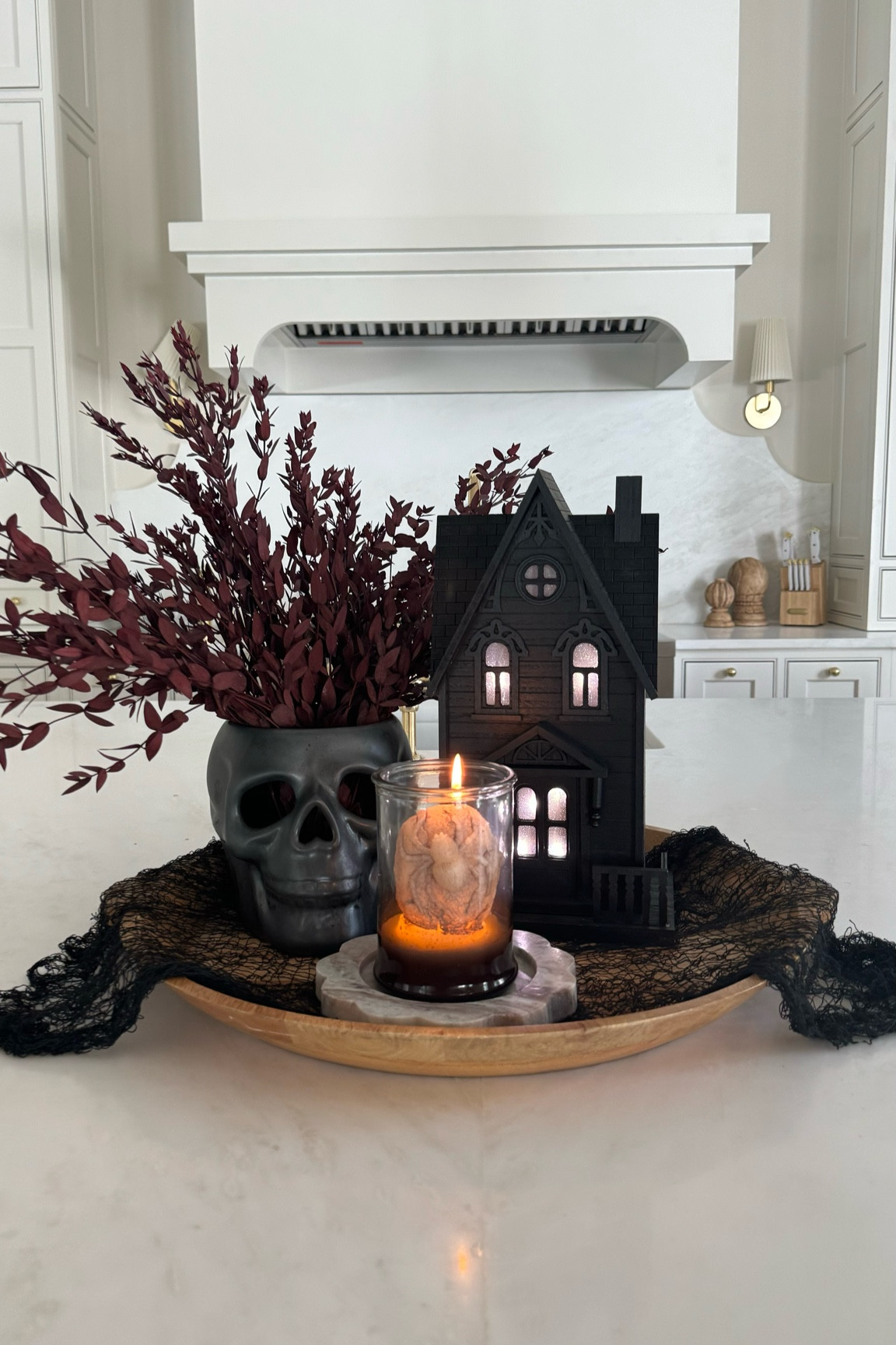 Spooky Halloween kitchen island centerpiece idea 

#LTKHome #LTKFindsUnder50 #LTKSeasonal