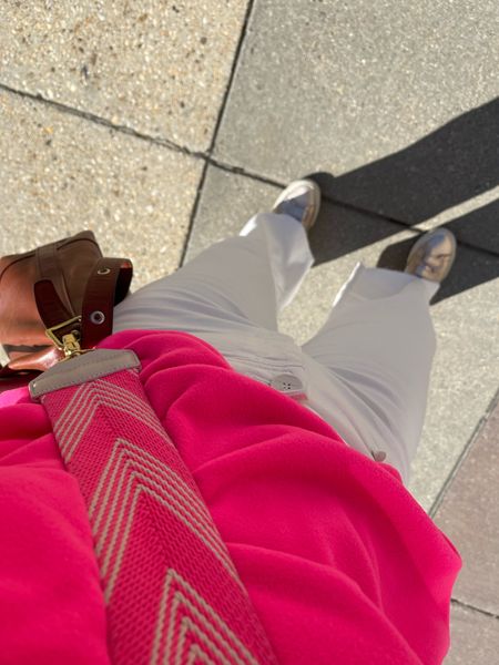 Spring outfit - high rise white jeans - neon pink turtleneck - colorful bag strap - spring sneakers 

#LTKsalealert #LTKSeasonal #LTKshoecrush