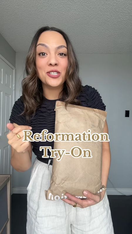 Reformation try on haul!
-Black asymmetrical mini skirt with lace underlay. I have a size 8. 
-Black sleeveless button up mini vest dress. I have a size 8. 
-Beige pinstripe lining tie front trousers. I try on a size medium. 

Anine Bing graphic tee, similar linked. 

#LTKVideo #LTKstyletip #LTKSeasonal