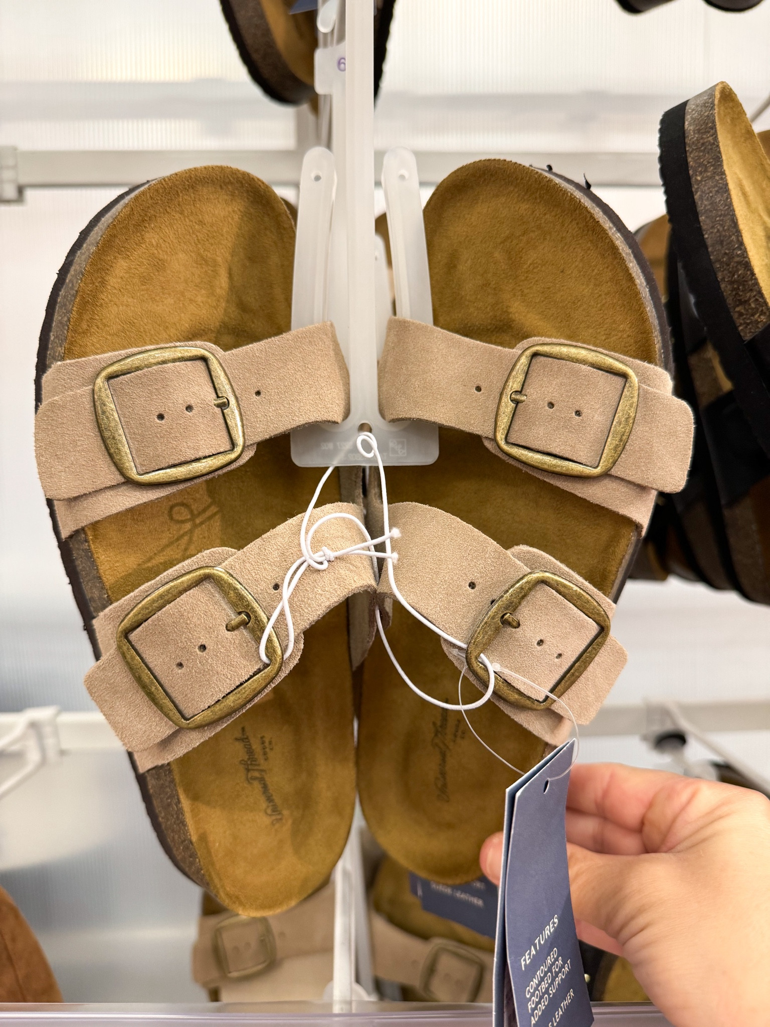 From the target app:

These Devin Two-Band Footbed Sandals from Universal Thread™ will be your new go-to pick for summer outings. These slip-on sandals feature a contoured footbed construction for comfortable wear, along with adjustable buckle instep straps at the top for a stay-put fit. Designed in a solid hue, you can simply pair them with a range of outfits from shorts and a tee to a sundress for laid-back warm-weather vibes.

#LTKshoecrush #LTKfindsunder50 #LTKstyletip