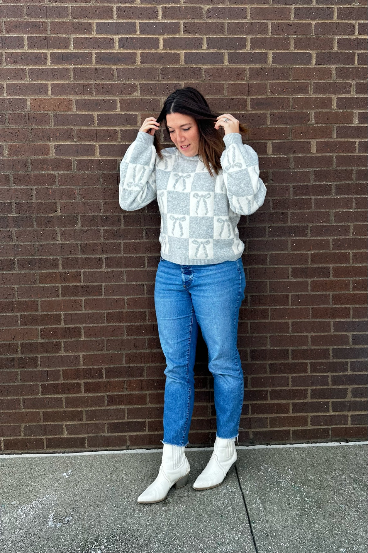 My coworker loved my bow sweater so we took some photos 🤍✨

#LTKStyleTip #LTKFindsUnder50 #LTKSeasonal
