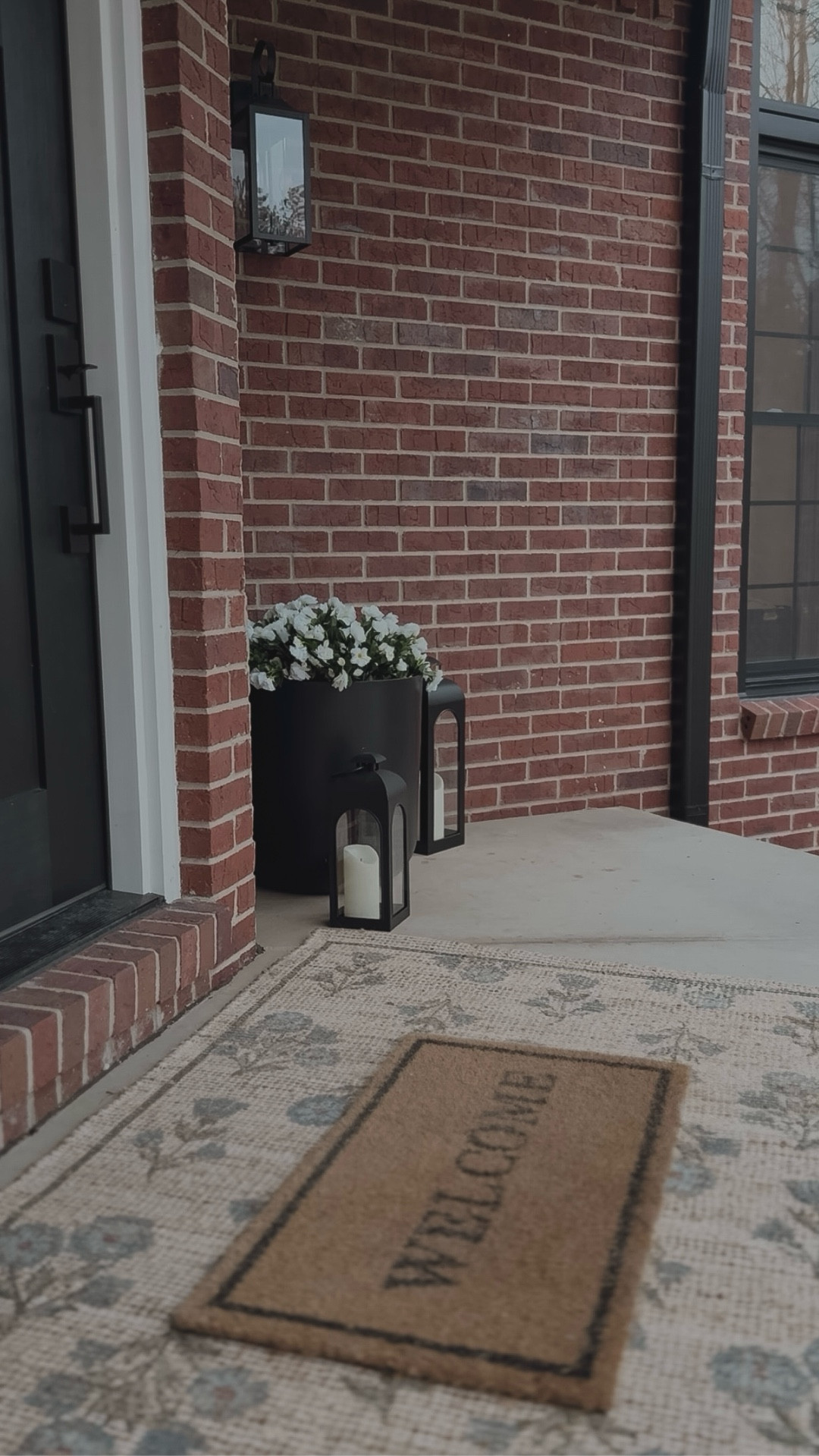 Front porch spring decor, front porch styling, front porch rug, black planter pots, welcome mat, layered porch rugs, front porch flowers, front porch plants

#LTKSeasonal #LTKSaleAlert #LTKHome