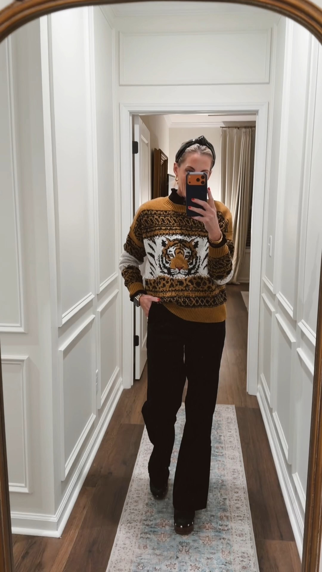 You are in luck this amazing tiger sweater is still on clearance under $60 from Anthropologie. That is a great deal. I linked up so many pant and top options to go with it.  

#LTKmomlife #LTKOver40 #LTKootd