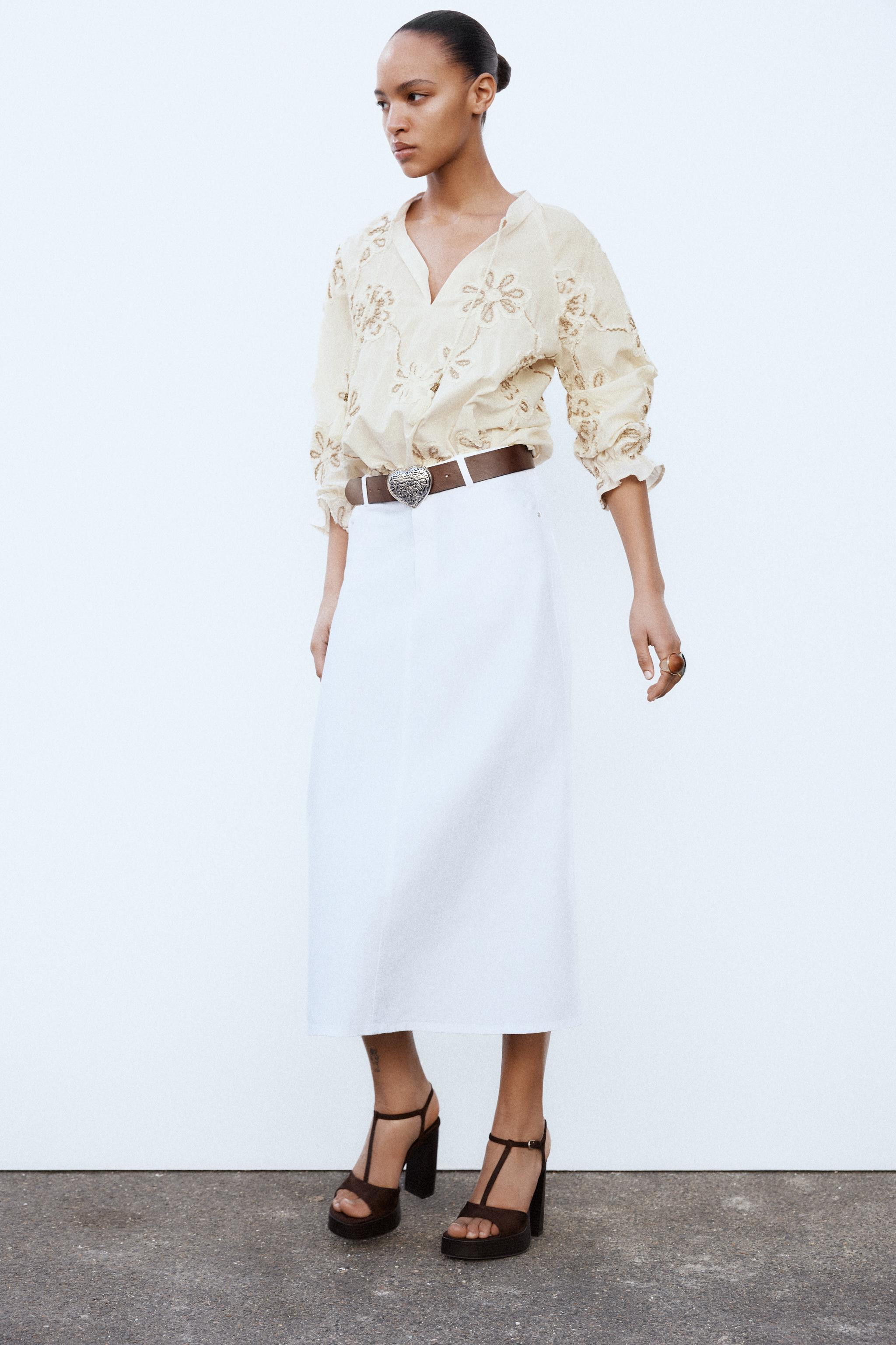 High-waisted skirt with five pockets. Flared hem. Front zip and button closure. | Zara US