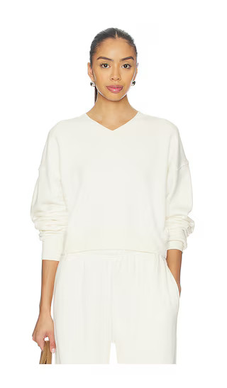 Cropped V-neck Sweatshirt in Cream | Revolve Clothing (Global)