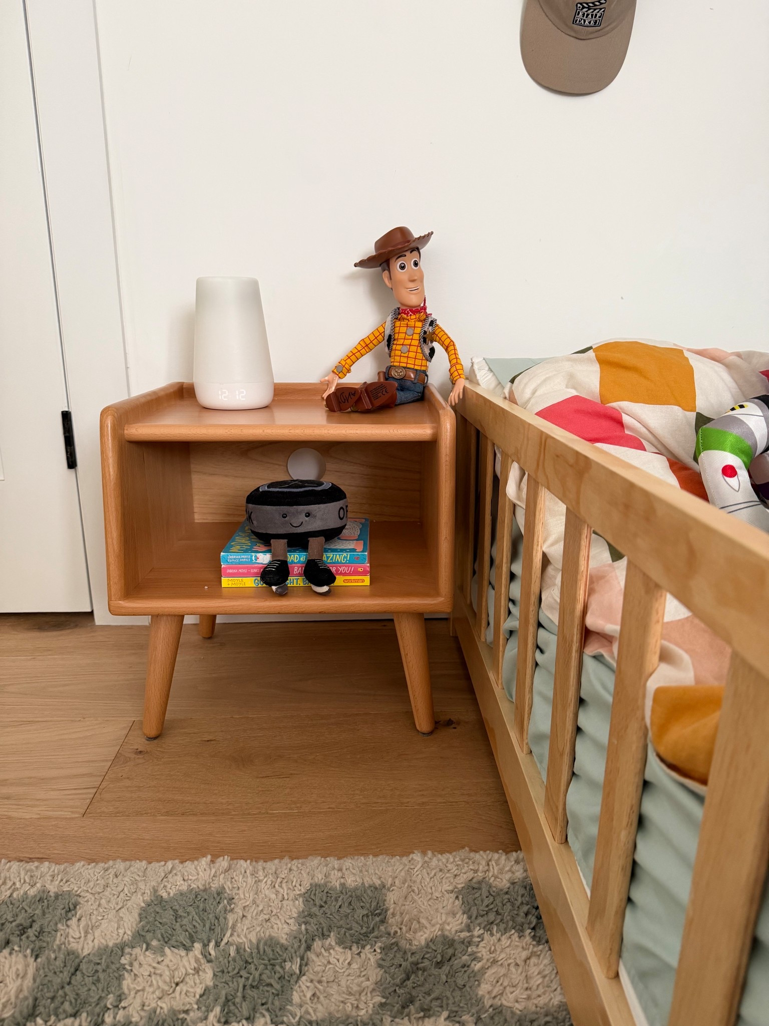 The perfect size night table for a floor bed with storage. We needed somewhere to pop our son’s hatch sound machine and water bottle in the night, and he picked some books to keep nearby to read when he wakes up in the morning  

#LTKHome #LTKKids #LTKmomlife
