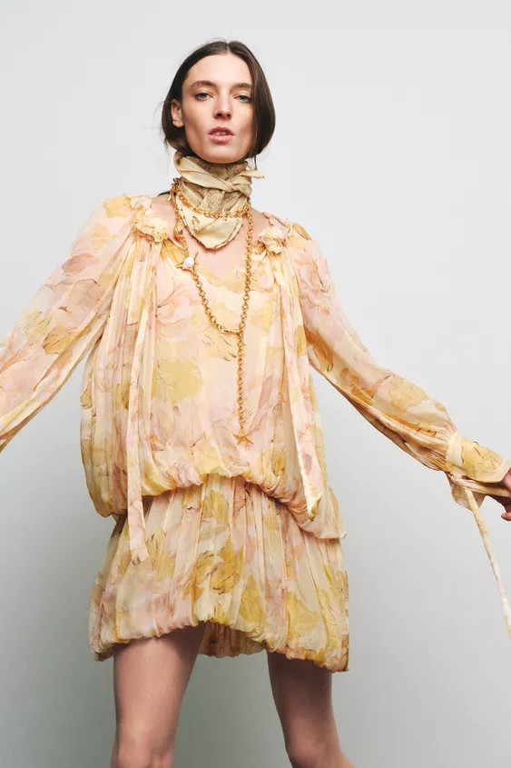 ZARA WOMAN COLLECTIONShort round neck dress with ruffles and adjustable V-neck with ties. Long sl... | Zara US