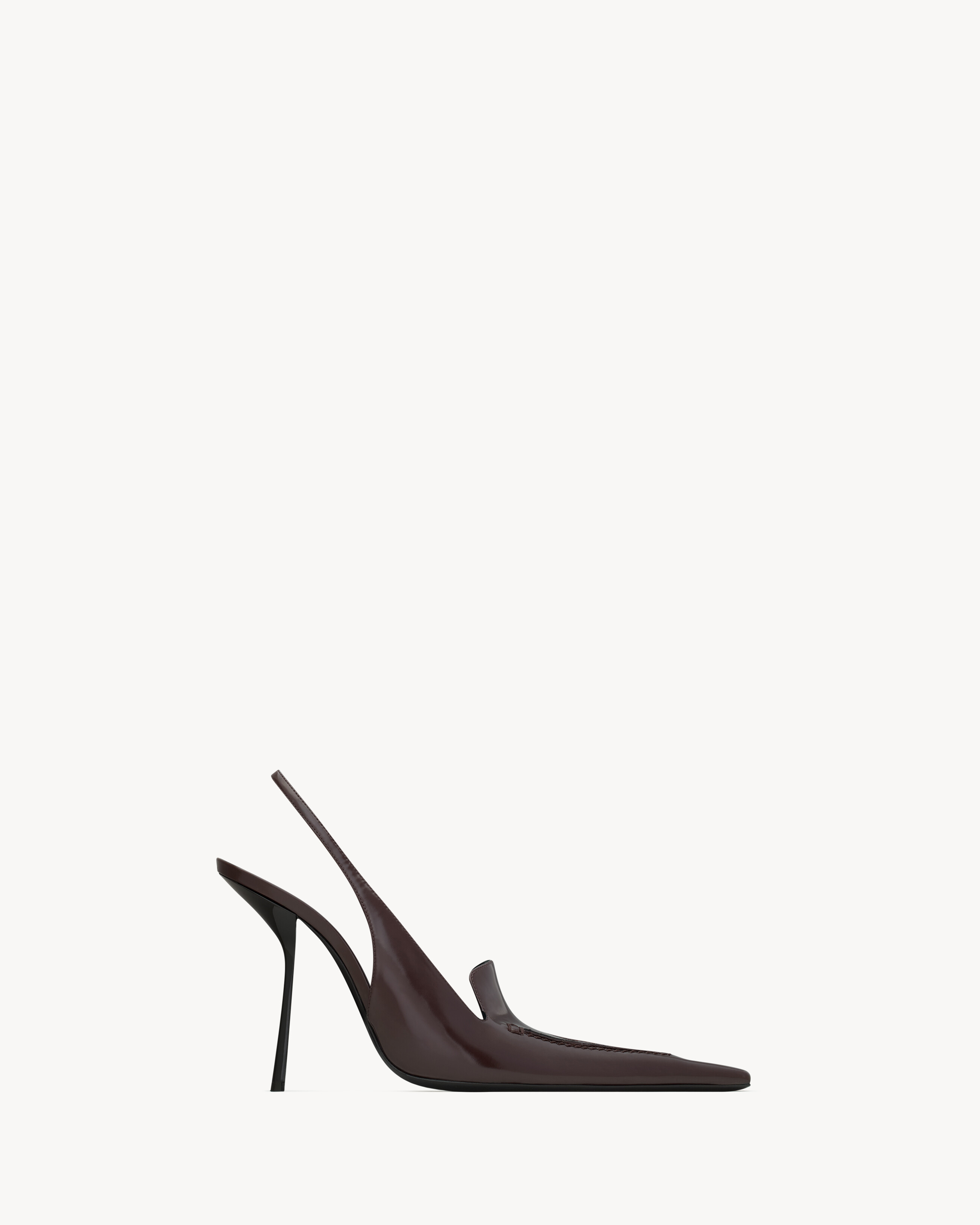 slingback loafer pumps with an angled metal stiletto heel and square pointed apron-stitch toe. | Saint Laurent Inc. (Global)