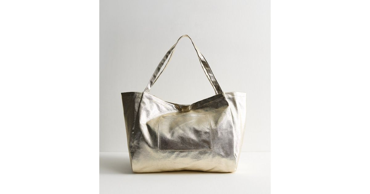 Gold Metallic Canvas Tote
						
						Add to Saved Items
						Remove from Saved Items | New Look (UK)