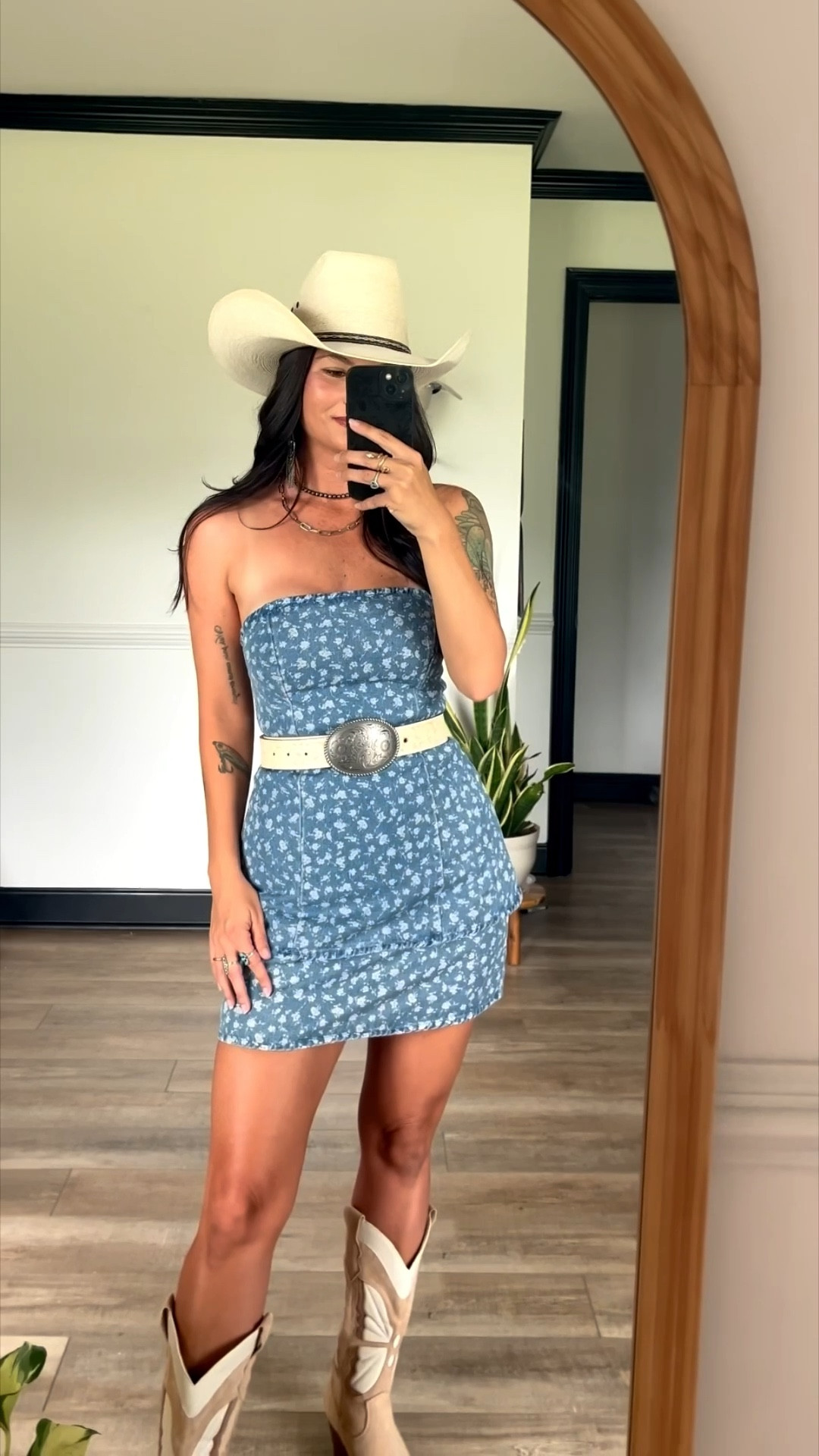How freaking adorable is this mini denim dress!? Paired with wester belt and tan western boots! A super cute country concert fit. Wearing xs

#LTKFestival #LTKootd #LTKgrwm