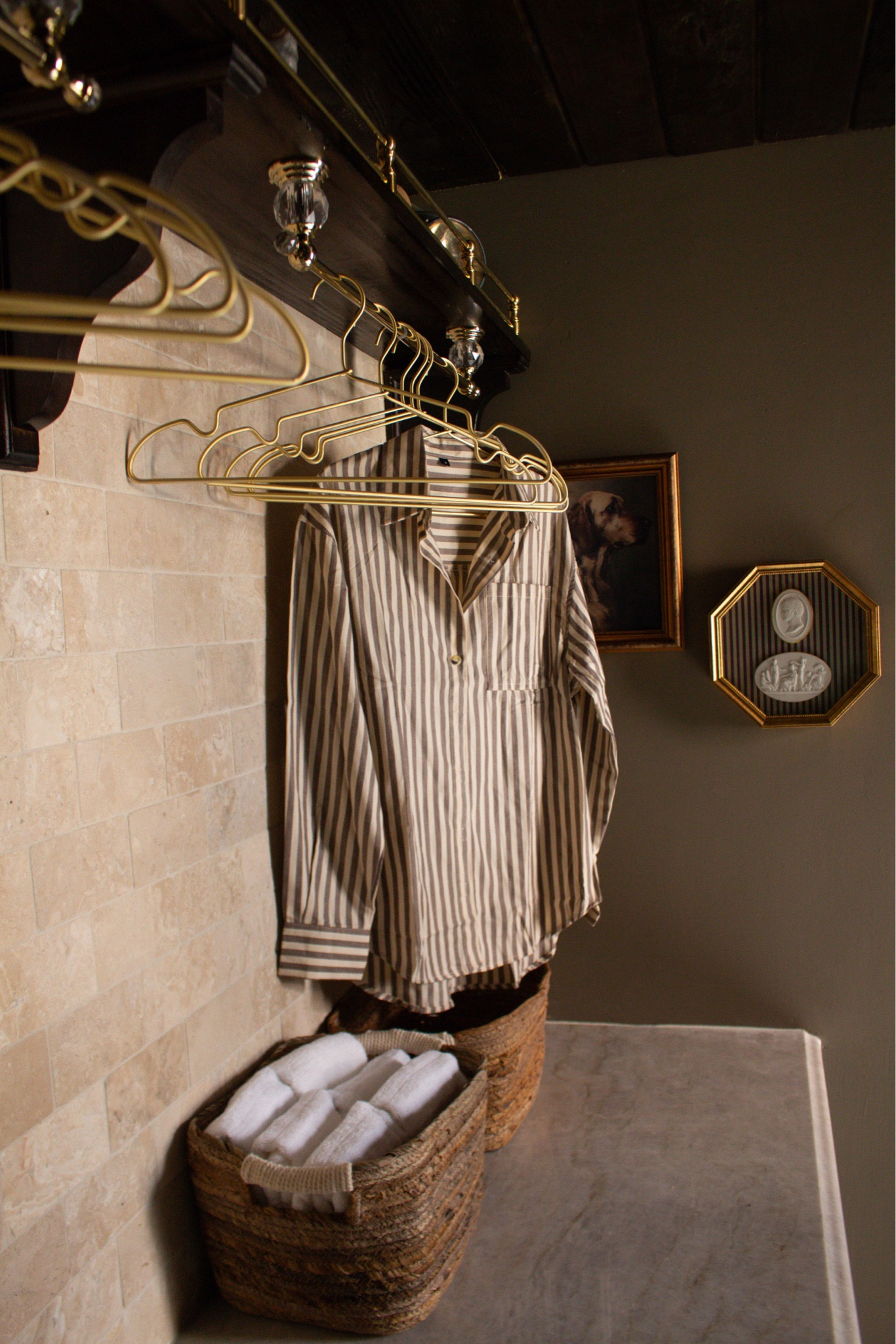 Moody paint, warm wood accents, and classic details create the coziest laundry room. Definitely saving this look for future inspiration.

#LTKSeasonal #LTKHome