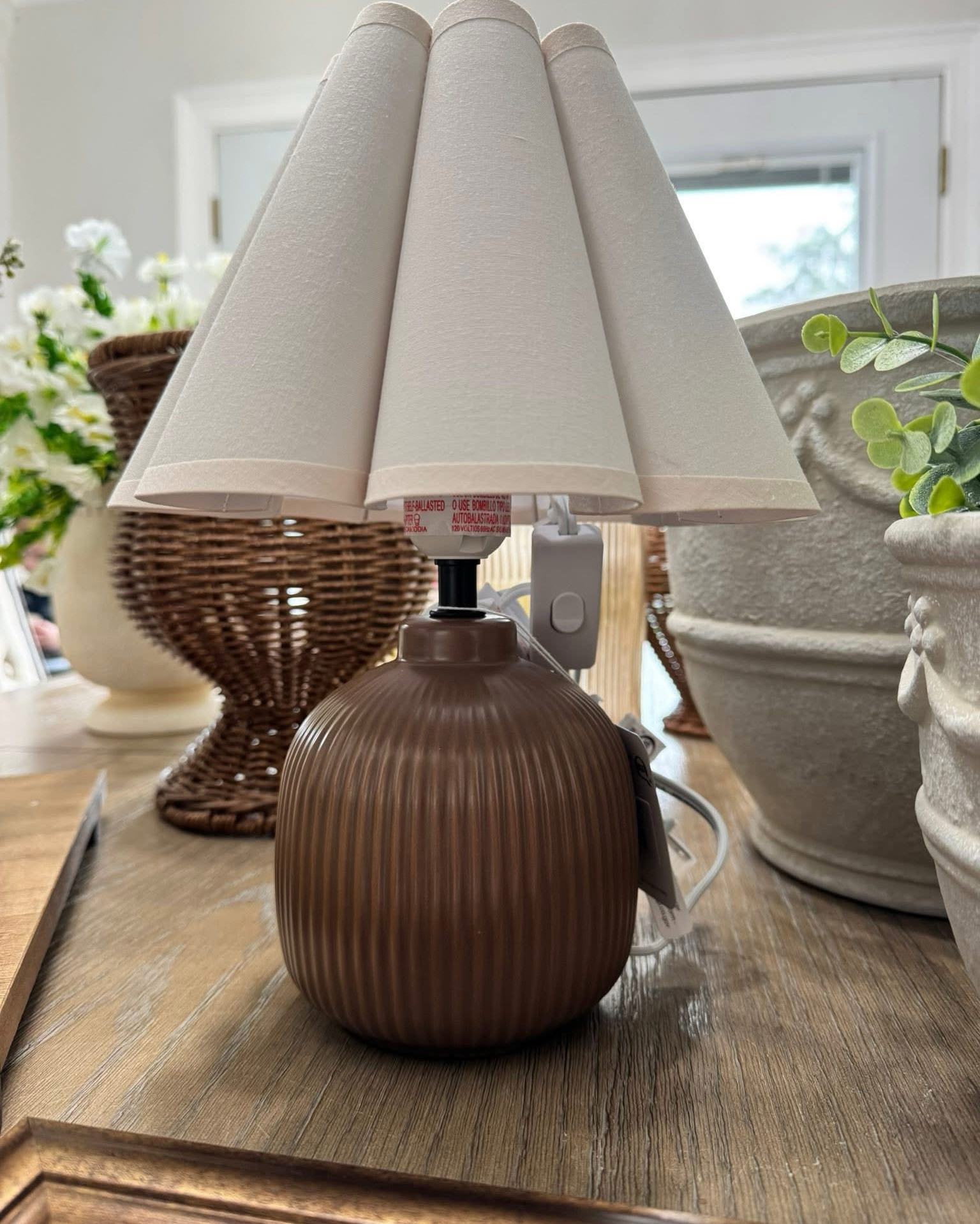 This little Walmart lamp is one of those pieces that just is RIGHT 🤎 the color is the perfect warm brown (not too cool, not too red), the shade shape feels elevated, and the base has that simple, timeless style that works anywhere. It’s one of those small accents that instantly makes a space feel more styled. Also comes in green if that’s more your vibe!! 

#walmartfinds #walmarthomedecor #walmartdecor #affordabledecor #budgetfriendlyhome #homedecorfinds #cozyhome #neutraldecor #modernorganic #mcgeeandco #targetstyle #ltkhome #liketkit #homeinspo #interiorstyling #decoronabudget #homeaccents #shelfstyling #cozycorners #neutralhome
 ￼

#LTKActive #LTKSaleAlert #LTKHome