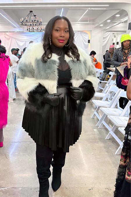 Plus size winter outfit idea. Try a cropped faux fur coat with a pleated leather skirt and boots. 

#LTKplussize #LTKstyletip #LTKmidsize