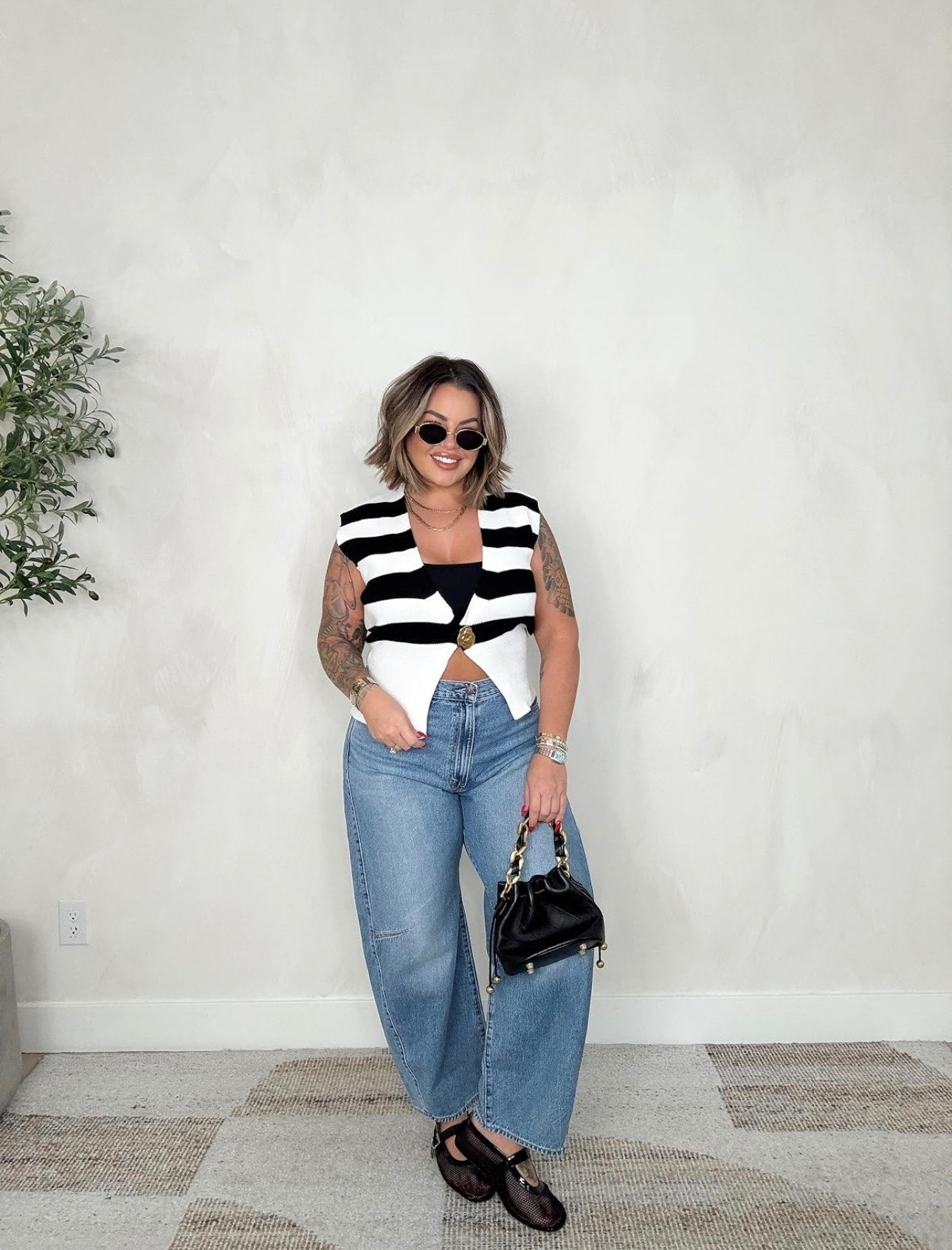 Summer to fall outfit idea 

Top is sold out linked similar 
Jeans are so good ! ( size notes to follow tho ) - I’m typically a size 31/12 - you must size up at least one size. If you want a baggy fit size up 2 sizes. I have these in a 32 & 33. The 32 fits great but sometimes I want a baggy oversized feel. These are the 33. DO NOT ORDER YOUR TRUE SIZE. You will have to return them. Hope that helps lol. 

#amazon #levis #falloutfits