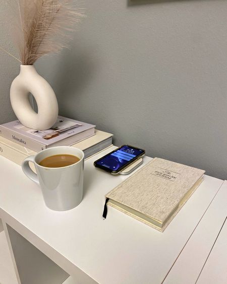 Morning essentials. I always start my day with a cup of coffee and some journaling! 💕 

Coffee mug| charging pad | vase | amazon | books 

#LTKhome #LTKunder50