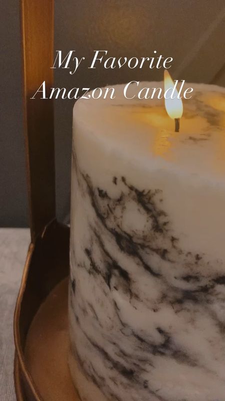 Absolutely love this candle for any season, but it’s especially cozy for fall+Halloween! Shop the link in my bio! 
#marble #glam #modern #transitional #fauxcandle #amazon #amazonhome #founditonamazon #amazonfinds #homedecor #homestyle #fallhome #falldecor 

#LTKstyletip #LTKSeasonal #LTKhome