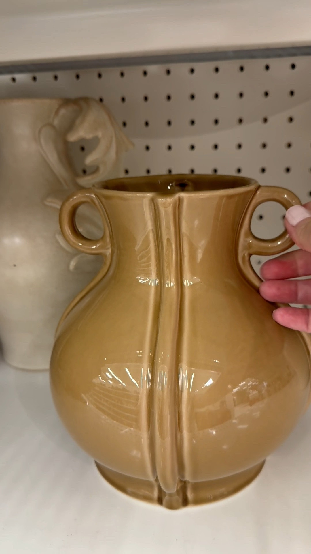 Beautiful vase for fall decor and stems…just look at that glaze color! 🍂 This ceramic vase features round handles, a center seam, and a gorgeous caramel glaze. Matching decorative bowl also available.

And if you’re a mosaic artist, this vase would also be a fun substrate for your tile work. For mosaic tips, tutorials + inspiration please visit my YouTube channel: YouTube.com/julieweilbacher, and follow @julieweilbacher on Instagram.

#decorativevase #tablescape #falldecor #ceramicvase #target #decorativeceramicvase #mosaic #vasewithhandles #brownvase

#LTKHome #LTKSeasonal