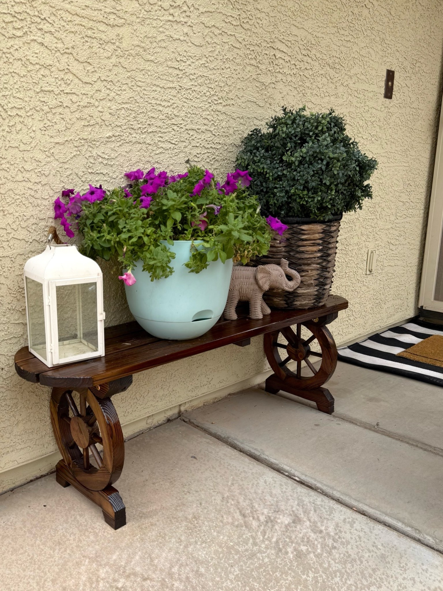 This wagon wheel inspired bench is really adorable! The glossy wood gives it a fresh finish. Perfect for your backyard or front porch. Love the way it looks by our front door. 

#WayFair #WayFairCreator #WoodenBench #PatioDecor

#LTKSaleAlert #LTKHome #LTKSeasonal