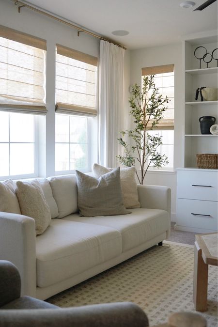 Neutral living room decor is my favorite kind of decor! 

Curtains. Roman shades. White coach. Throw pillow. Shelf decor. Neutral decor. Pottery barn  

#LTKSaleAlert #LTKFindsUnder100 #LTKHome