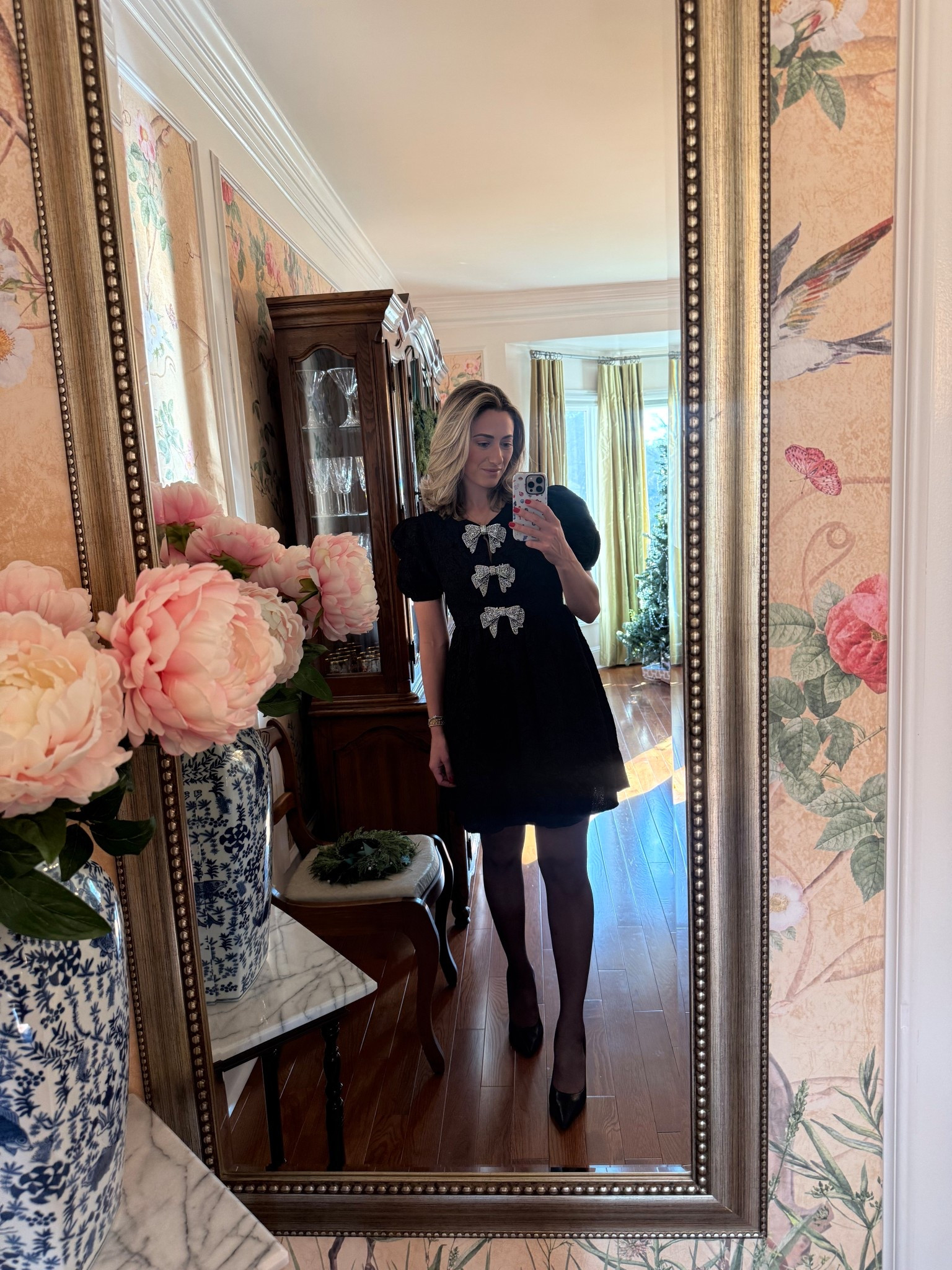 A little festive, a little classic, and just the right amount of sparkle 🤍✨
This bow-detail black dress is my go-to for Christmas Eve or even New Year’s Eve. Timeless silhouette, subtle shine, and effortlessly elegant the kind of piece you’ll reach for year after year. Paired with sheer tights and classic black pumps for a polished, party-ready look that works for dinner, cocktails, or ringing in the new year.

Perfect if you love a chic, feminine moment that still feels classic and collected. 🖤🎄🥂

Shop the full look below.


#LTKgrwm #LTKHoliday #LTKootd