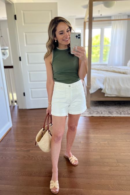 Love this $10 tank top! I’m wearing it in petite xs but it fits small enough that I think regular sizing could work too (petite sizes are selling out). It has a cropped fit. 

Shorts: 00/24 
Sandals: run narrow 

#LTKSeasonal #LTKxMadewell #LTKstyletip