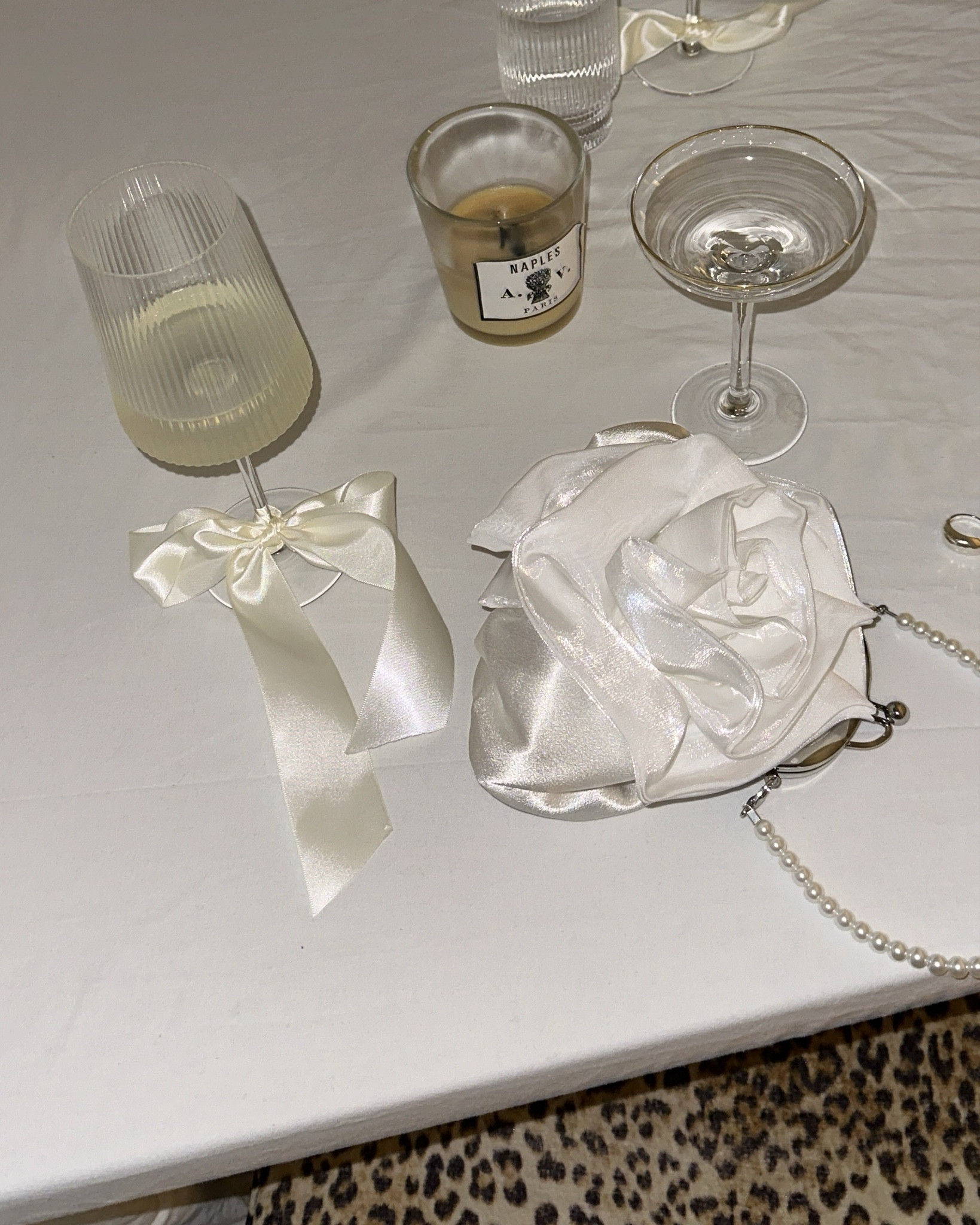 Party bags and party glasses 🎀🎀🍷🍷
3d flower bag | White flower bag | Flower appliqué | Bow wine glass decor | Designer candle | Ribbed glasses | Rib wine glass | Ferm Living | Evening bag with pearl strap | Wedding accessories | Astier de Villatte Naples Glass Scented Candle | Leopard print stool 

#LTKSummerSale #LTKsummer #LTKhome