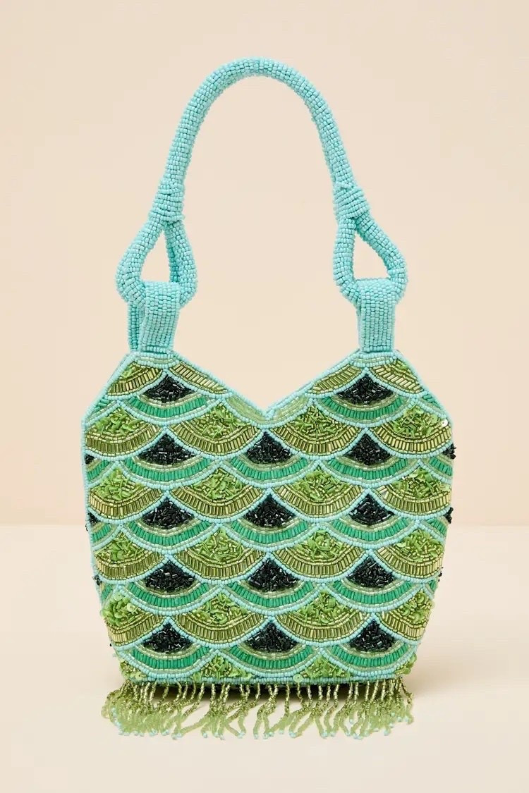 The Sonia Green Multi Beaded Fringe Handbag brings playful texture, vibrant color, and handcrafted detail together in a statement piece that instantly elevates any summer look 💚✨ Under $50.

Keywords:

* beaded handbag
* fringe handbag
* statement bag
* green handbag
* summer handbag
* vacation purse
* embellished bag
* evening handbag
* handcrafted inspired
* intricate beadwork
* textured accessories
* artisan style bag
* detailed embellishment
* statement craftsmanship
* colorful bead detailing
* fashion forward accessories
* vacation outfit
* resort style
* summer party outfit
* beach dinner look
* tropical vacation style
* girls night outfit
* festival fashion
* brunch accessories

#LTKTravel #LTKgrwm #LTKdayinmylife