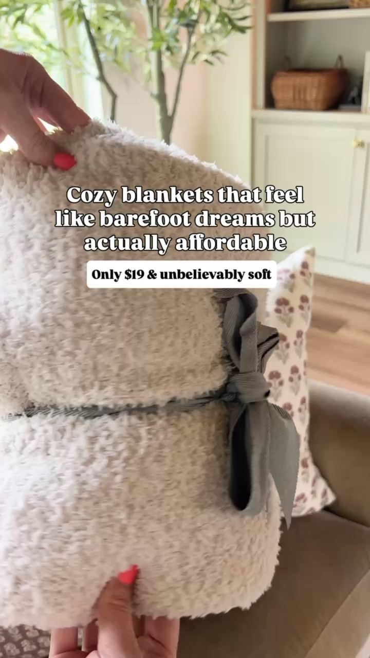 This Walmart blanket is so soft and comfy and only $19! The perfect fall decor in your living room!

#LTKHome #LTKSeasonal #LTKmomlife