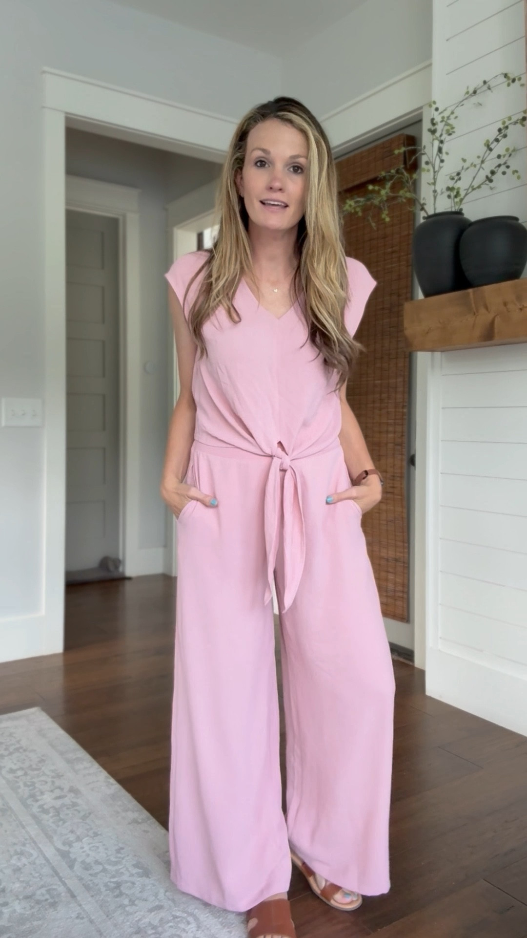 I was skeptical about the crop top on this to be set, but I actually love it because you can pull the pants up high enough that it doesn’t really show your midsection if you don’t want to! I love the fabric and the color of this pink set. I got several compliments on it when I wore it at the beach. It’s so soft and comfortable. Also affordable yet looks high-end looks great with sandals or heels!

#LTKStyleTip #LTKWorkwear #LTKFindsUnder50