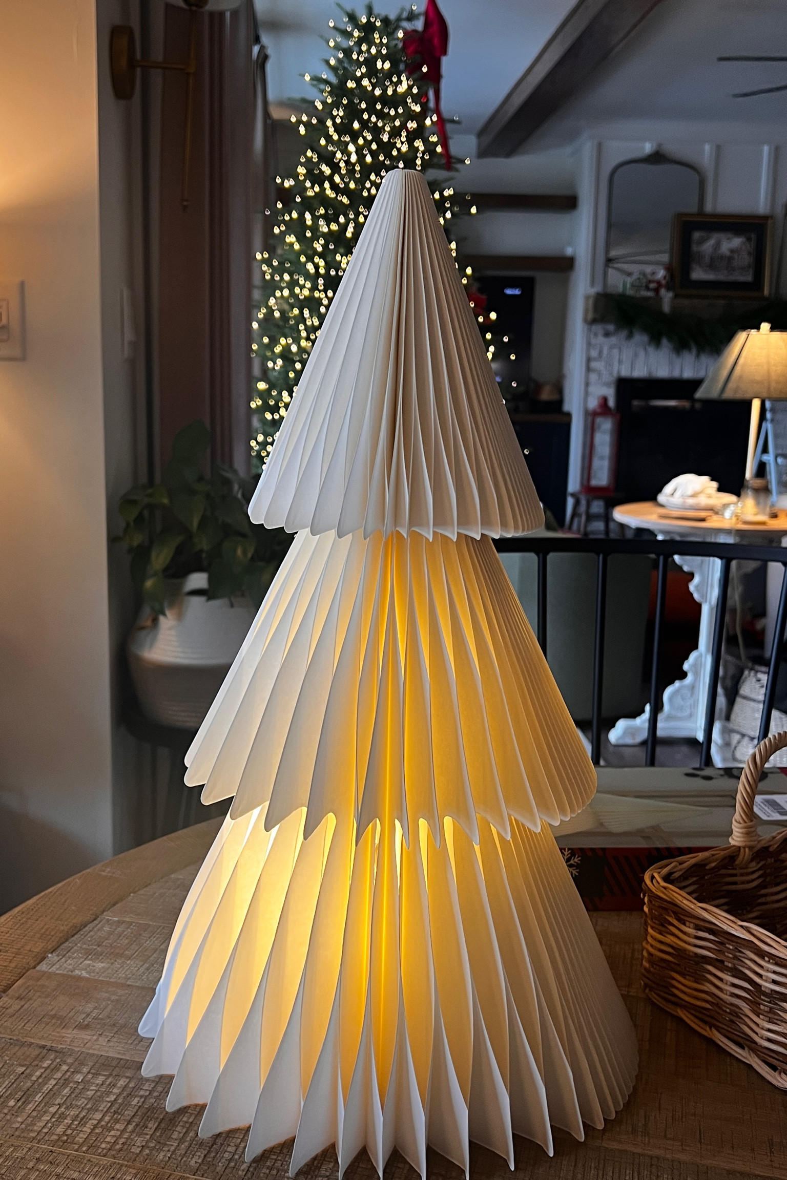 This gorgeous paper tree made from high quality paper that will last is so beautiful and unique. It comes with a battery operated light and batteries! So gorgeous for the holiday season. Christmas decor you will love. 

#LTKHome #LTKSeasonal #LTKHoliday