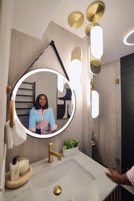 Mirror, mirror on the wall, who's the brightest of them all? ✨ These pendent light fixtures and mirror have definitely stolen the spotlight in this bathroom! Shop these below ⬇️ #bathroom #homedecor #homerefresh #lightfixture #bathroomdecor #ledmirror 

#LTKFind #LTKSeasonal #LTKhome