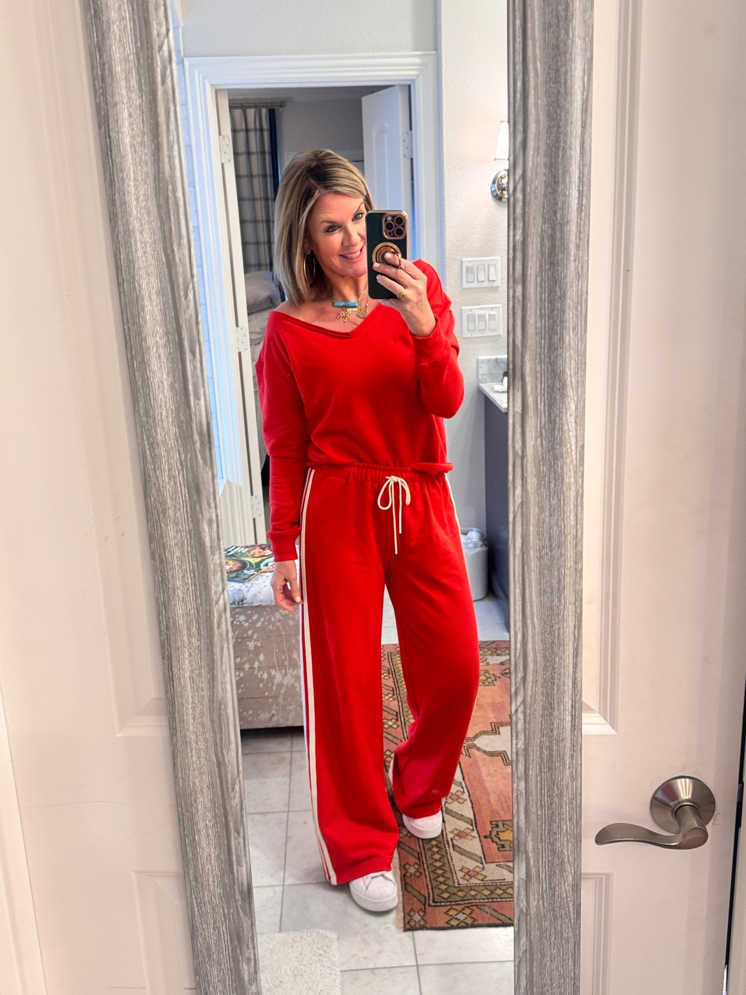 If you’re living in that season of meetings, mom duties, carpool, laundry, repeat… this set is a win, and yes, it totally works for a cozy Valentine’s Day too. 

This comfy Target lounge set feels like pajamas but looks like you tried, which is honestly the goal most days.
Affordable and easy

It runs big.
I’m in an XS top and small bottoms, and I’m normally not an XS.

#LTKOver40 #LTKValentine