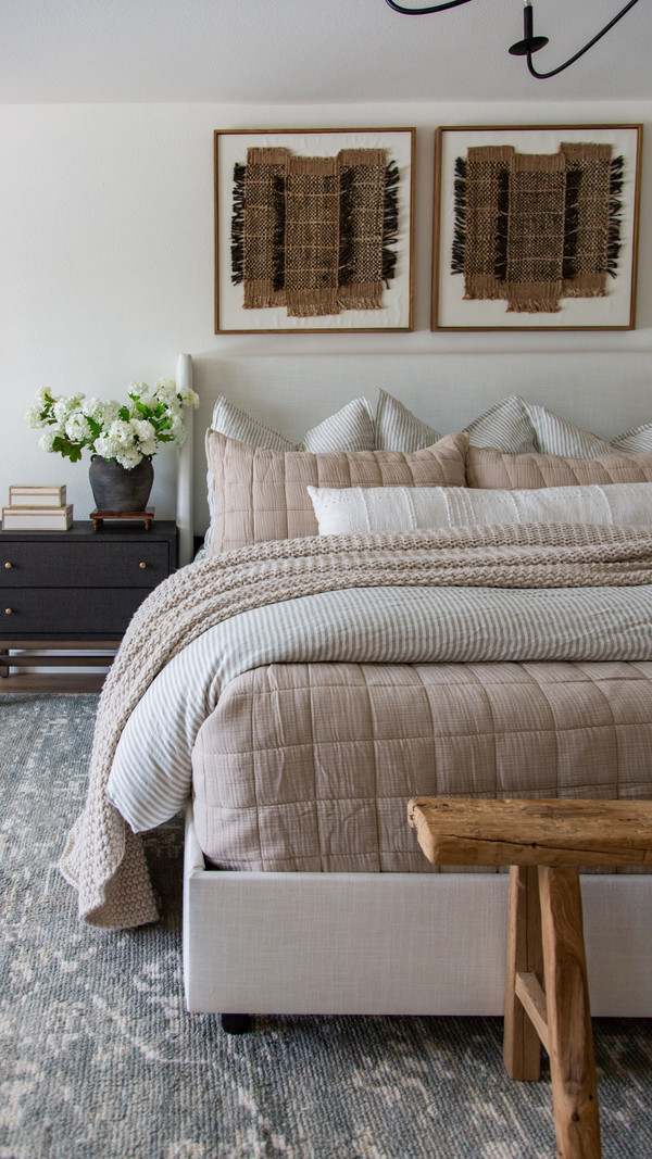My formula for a bed that looks extra cozy: oversized Euro shams + a textured quilt…