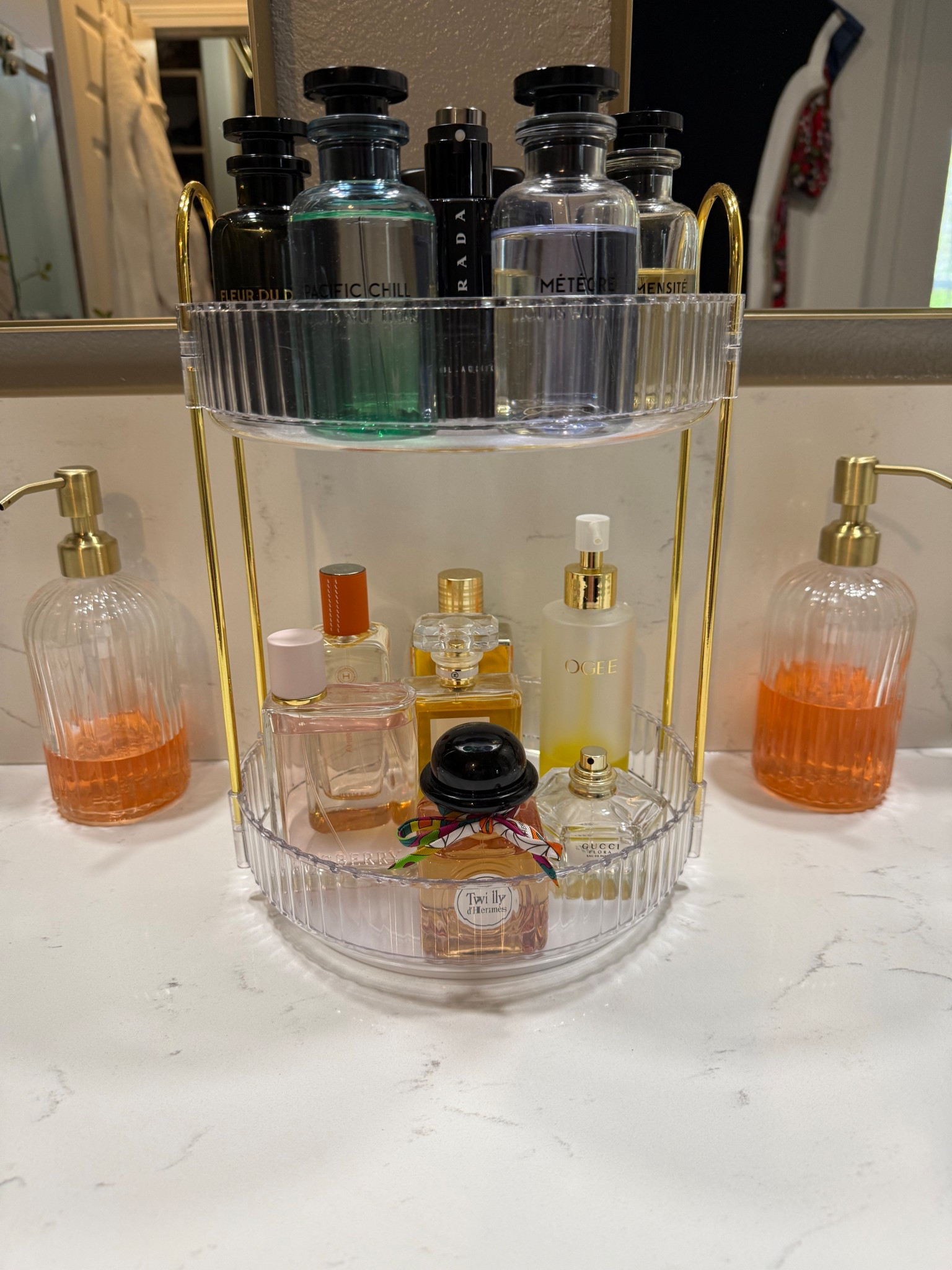 I love this gold and acrylic organizer. It has 3 tiers but I only chose to use 2. I love how it looks and even more how well it spins. Extremely functional and pretty 😍 

#LTKBeauty #LTKHome #LTKSaleAlert