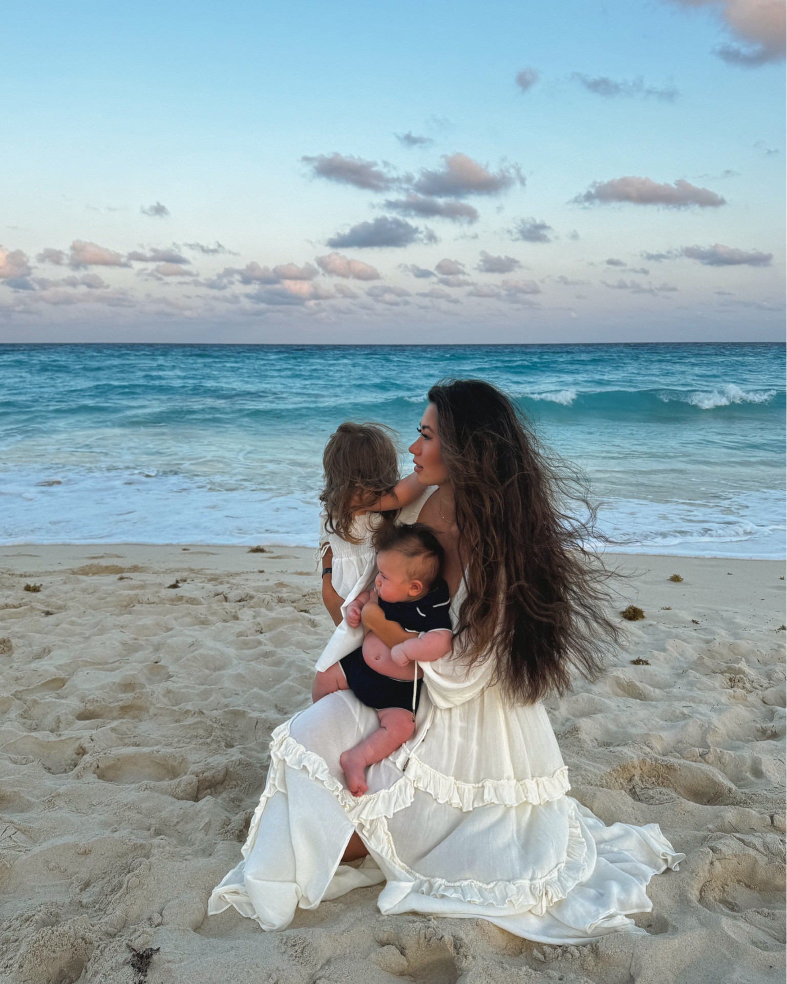 Free people dress I wore for some iPhone family photos on the beach! I run between xs & s and find I usually need to size down to xs in FP dresses! 👗 

Beach dress, resort wear, free people, free people dress, vacation, spring break, bump friendly 

#LTKSeasonal #LTKtravel #LTKfamily