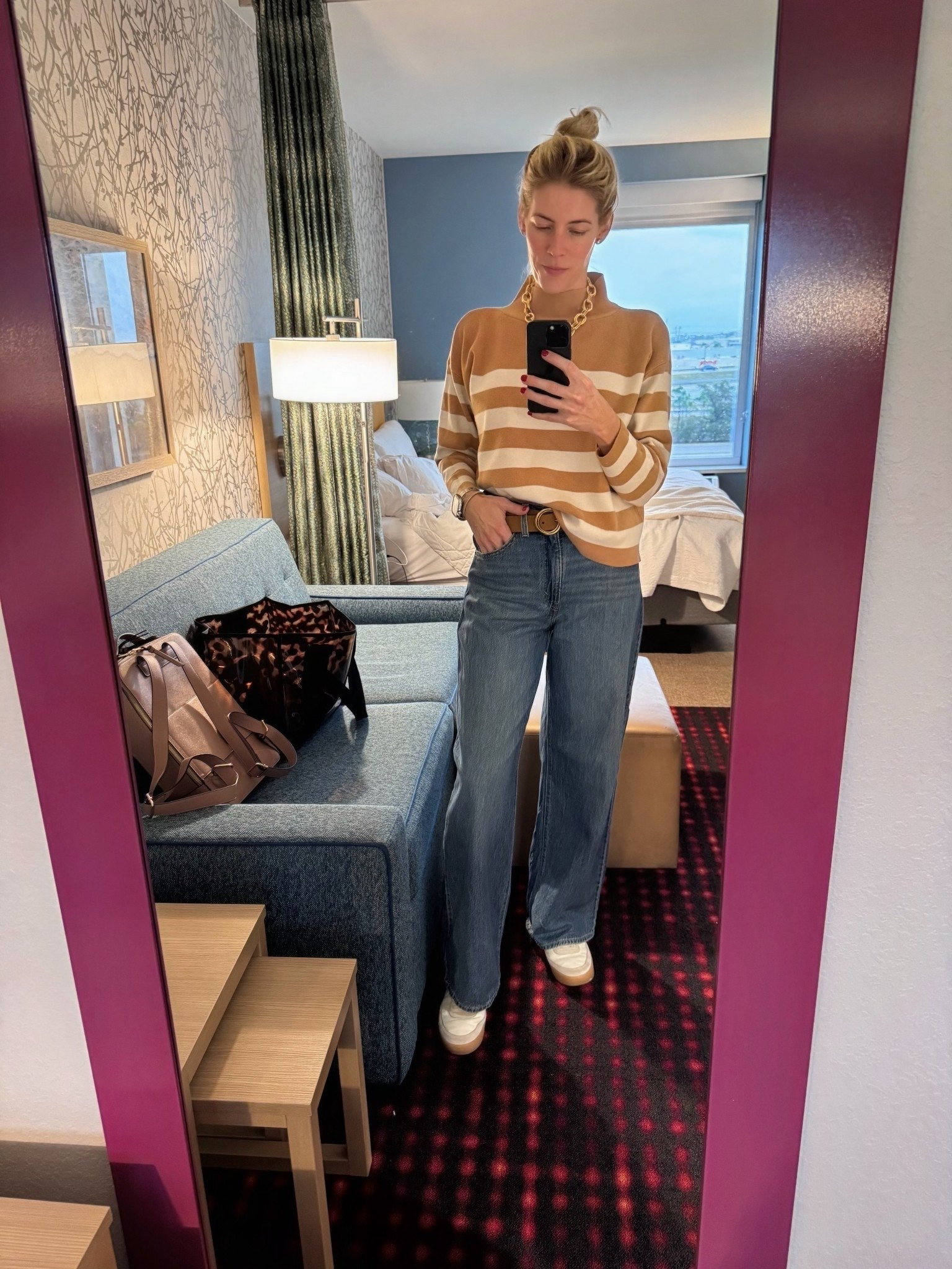 Business causal for work. 

Necklace - Amazon 
Sweater - Anthropologie 
Denim - Levi’s 
Belt - Target 
Sneakers - Nike via Amazon 
Leopard Tote - Flaunt 
Backpack - CALPAK 

Wearing small in top. 27 in jeans with 33in in seam. My weight is 150 and 6 ft tall. Average size 4/6. Wish I had sized down bc these jeans run Big but short IMO  

#LTKootd #LTKTall #LTKOver40