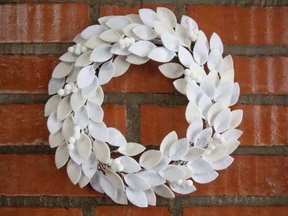 Read the full title
    White Felt Wreath | Leaf Wreath with Pompoms | Christmas Wreath | 12" Wre... | Etsy ROW