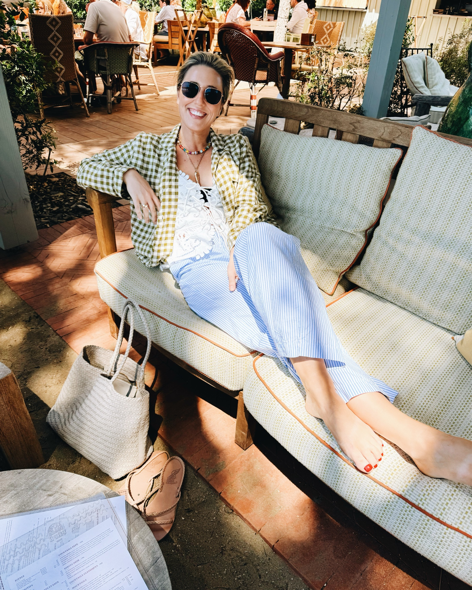 Beach club look in Saint Tropez. My “jacket” is the top to the pajama set linked. I also wear the bottoms as shorts in the summer. The gold necklace was a gift from my Husband and the fish charm was my grandmothers.

#LTKTravel #LTKSwim #LTKStyleTip