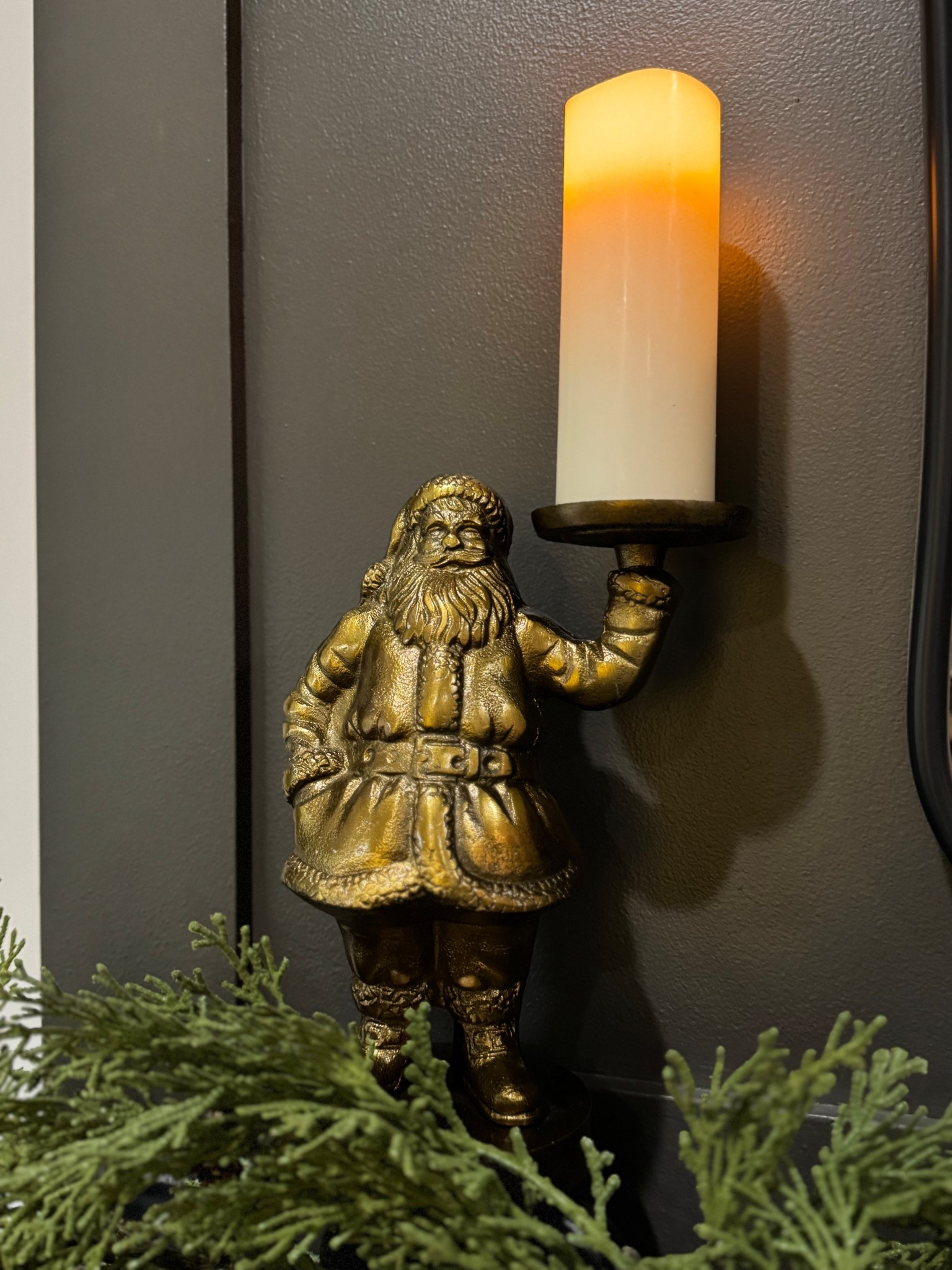 Brass Santa candle holder .

Christmas mantel decor 

#LTKHoliday #LTKHome