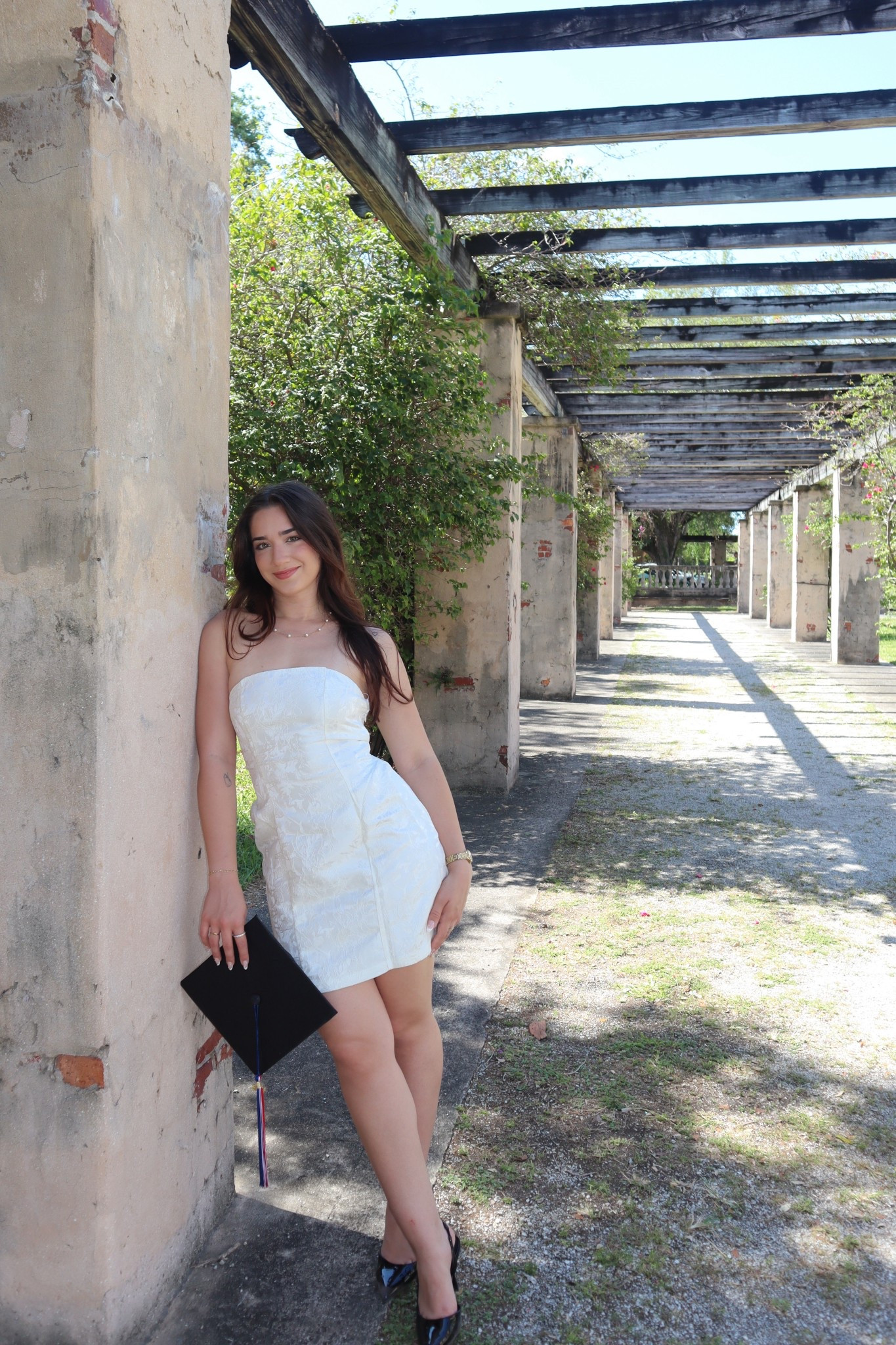graduation dress 
white strapless 
princess polly with corset tie in back 
loved wearing this for my pictures 

#LTKgrwm