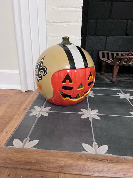 nfl new orleans saints football ceramic pumpkin, front porch decor, halloween decoration, sports gift for him

#LTKSeasonal #LTKHalloween #LTKmens
